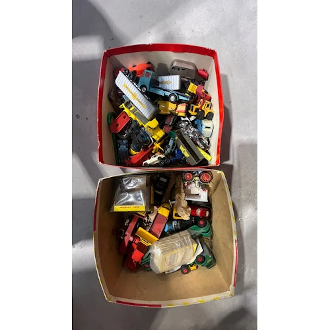 Two small boxes containing loose vehicles to include Matchbo...