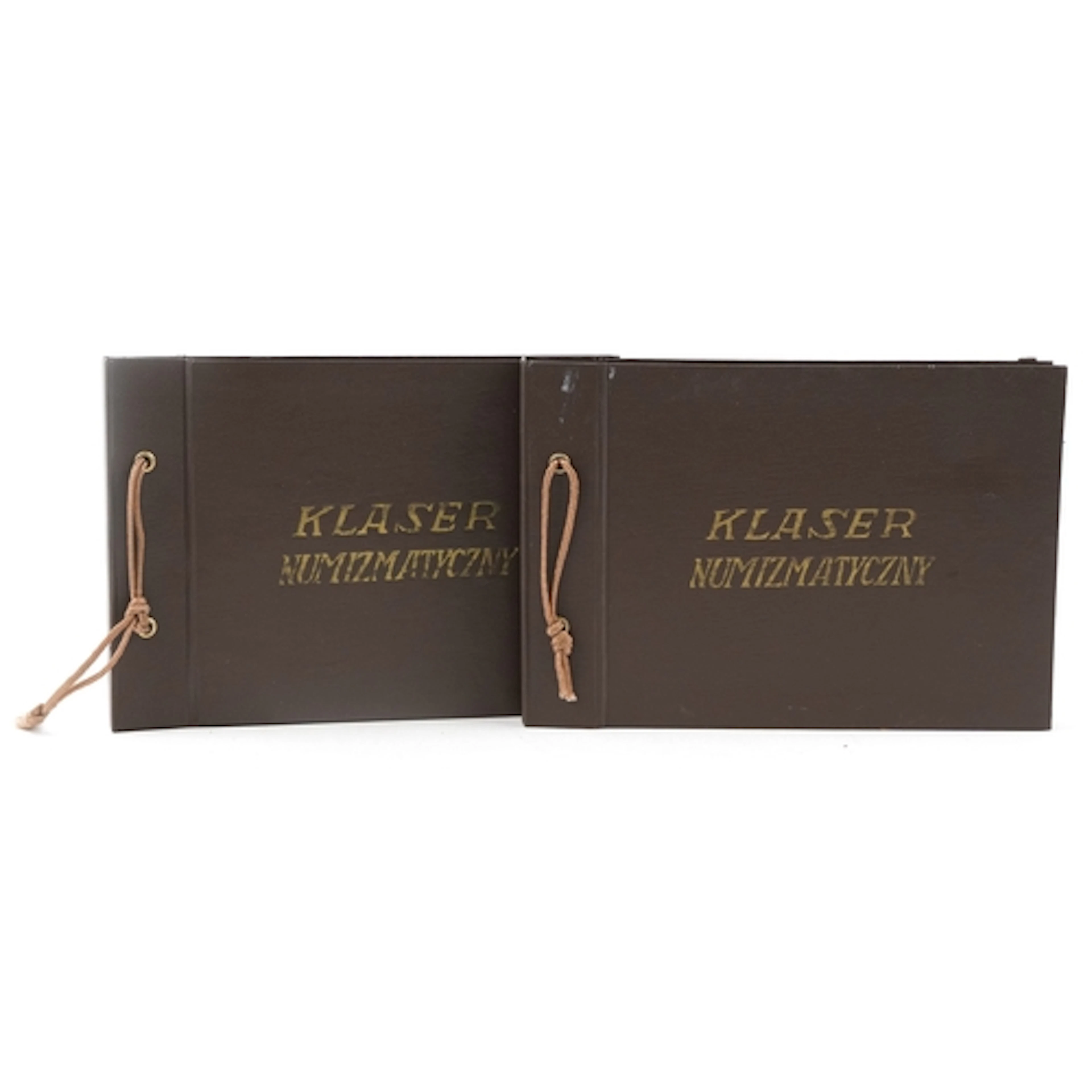 Two Polish coin albums containing various Polish coins inclu...