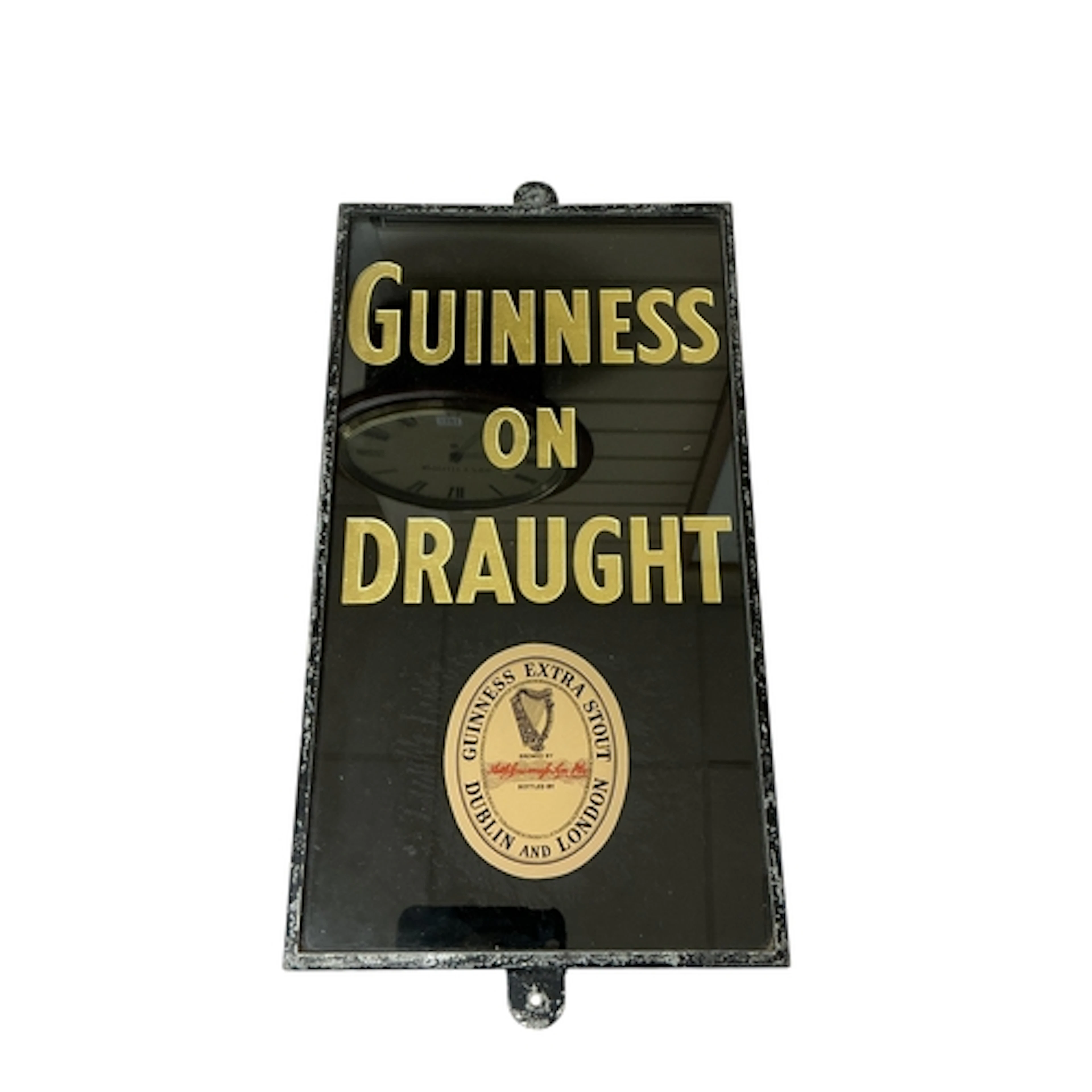 A vintage glass 'Guinness on Draught' black and gilt adverti...