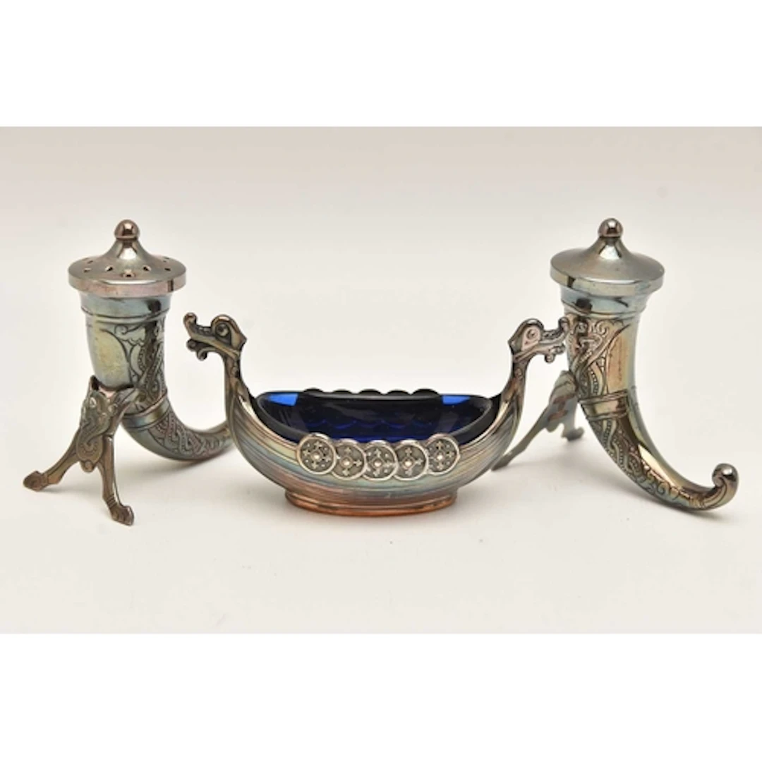 A NORWIGIAN CRUET SET, to include a pair of horn form salt a...