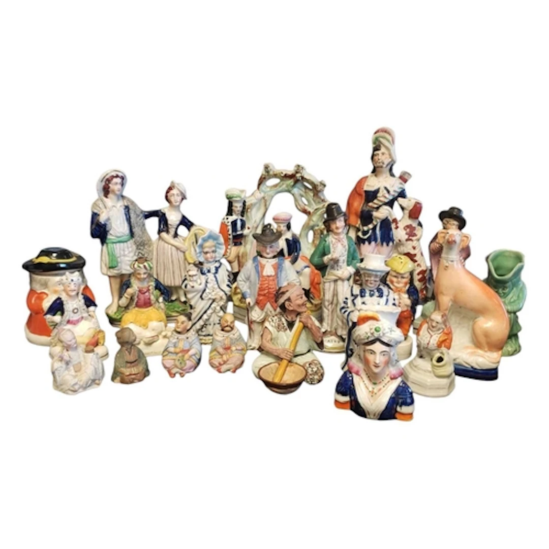 A collection of early 19th century Staffordshire figures. To...