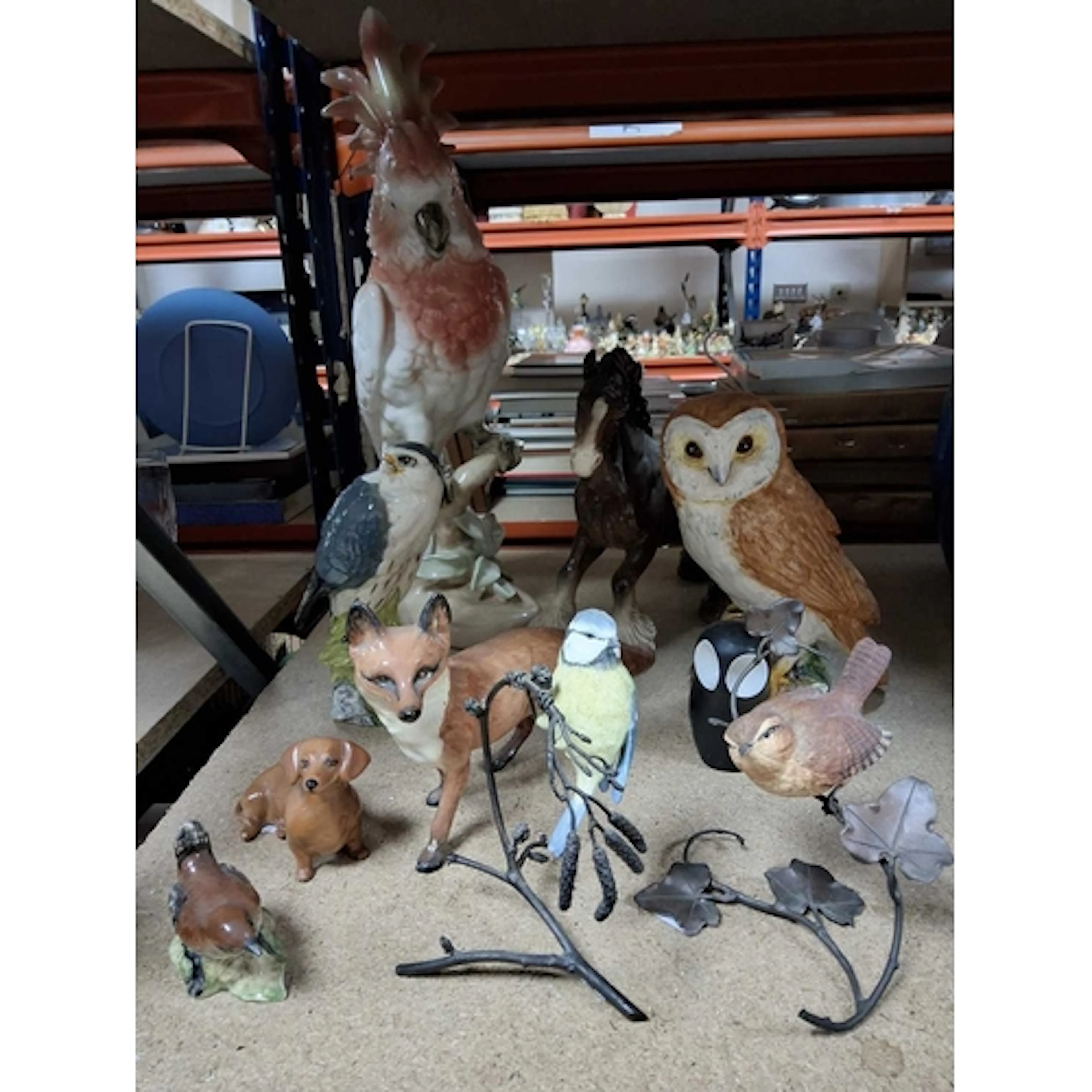 A GROUP OF BESWICK, COALPORT AND ROYAL DUX ANIMALS AND BIRDS...