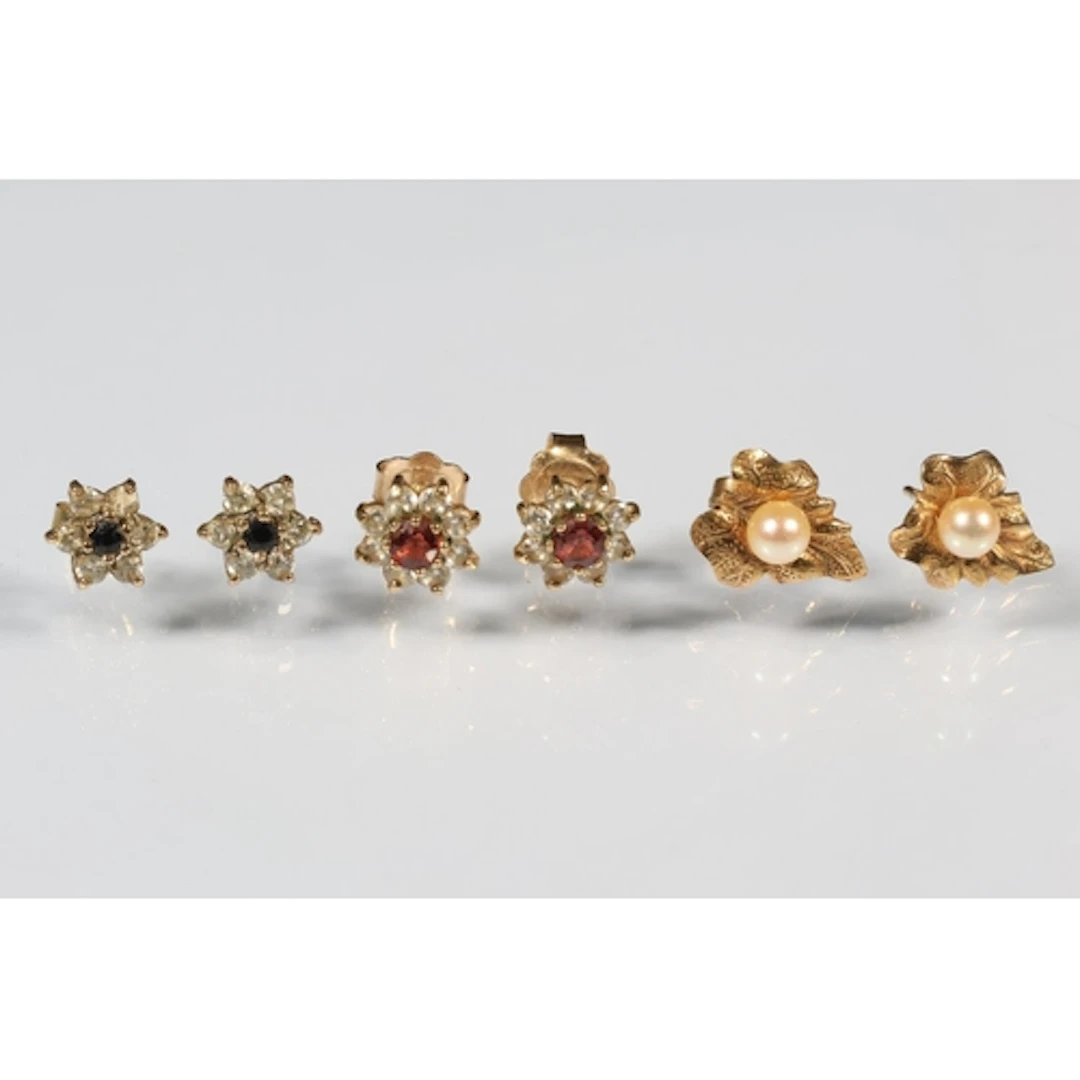 Pair of 9ct gold ear studs 1.4g gross and two pairs of gold ...