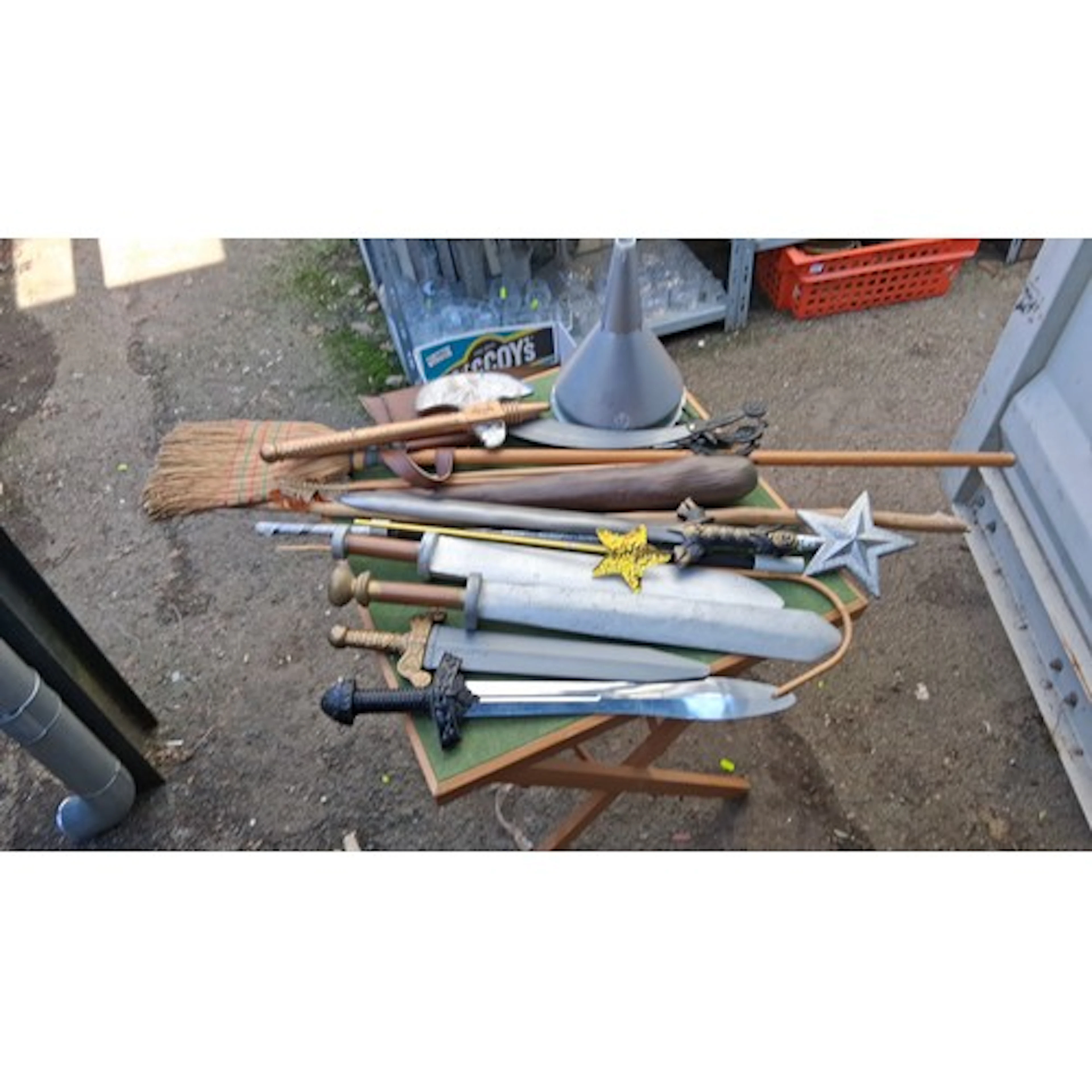 A group of costume and theatrical props, including plastic s...