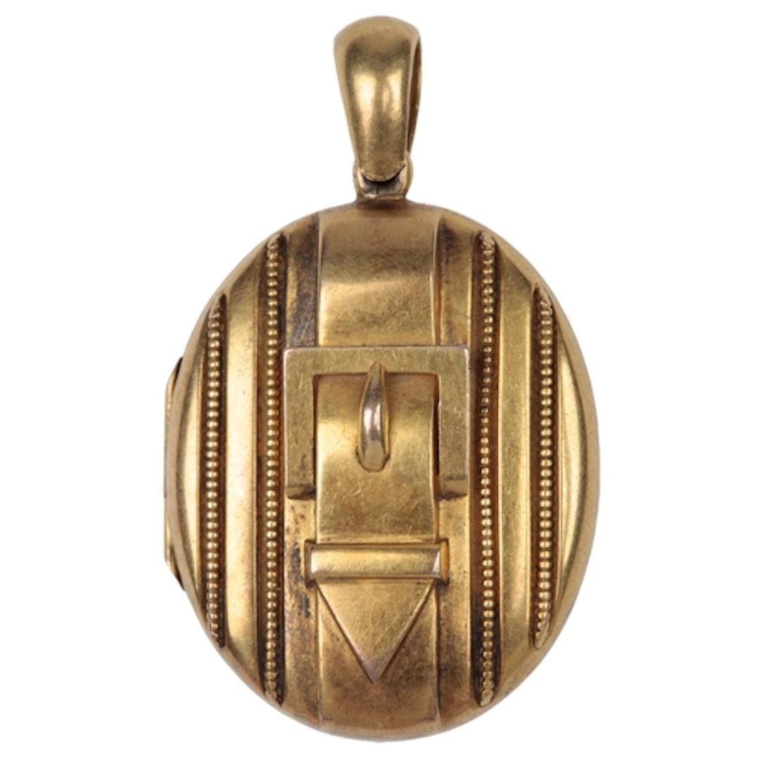 A Victorian gold locket, mid 19th century, of oval outline, ...