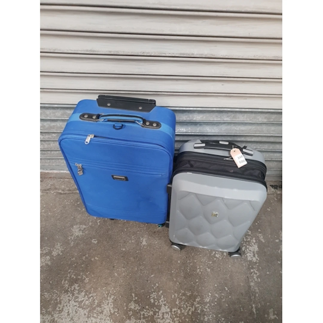 TWO SUITCASES including IT and Jade Design Note: cases and b...