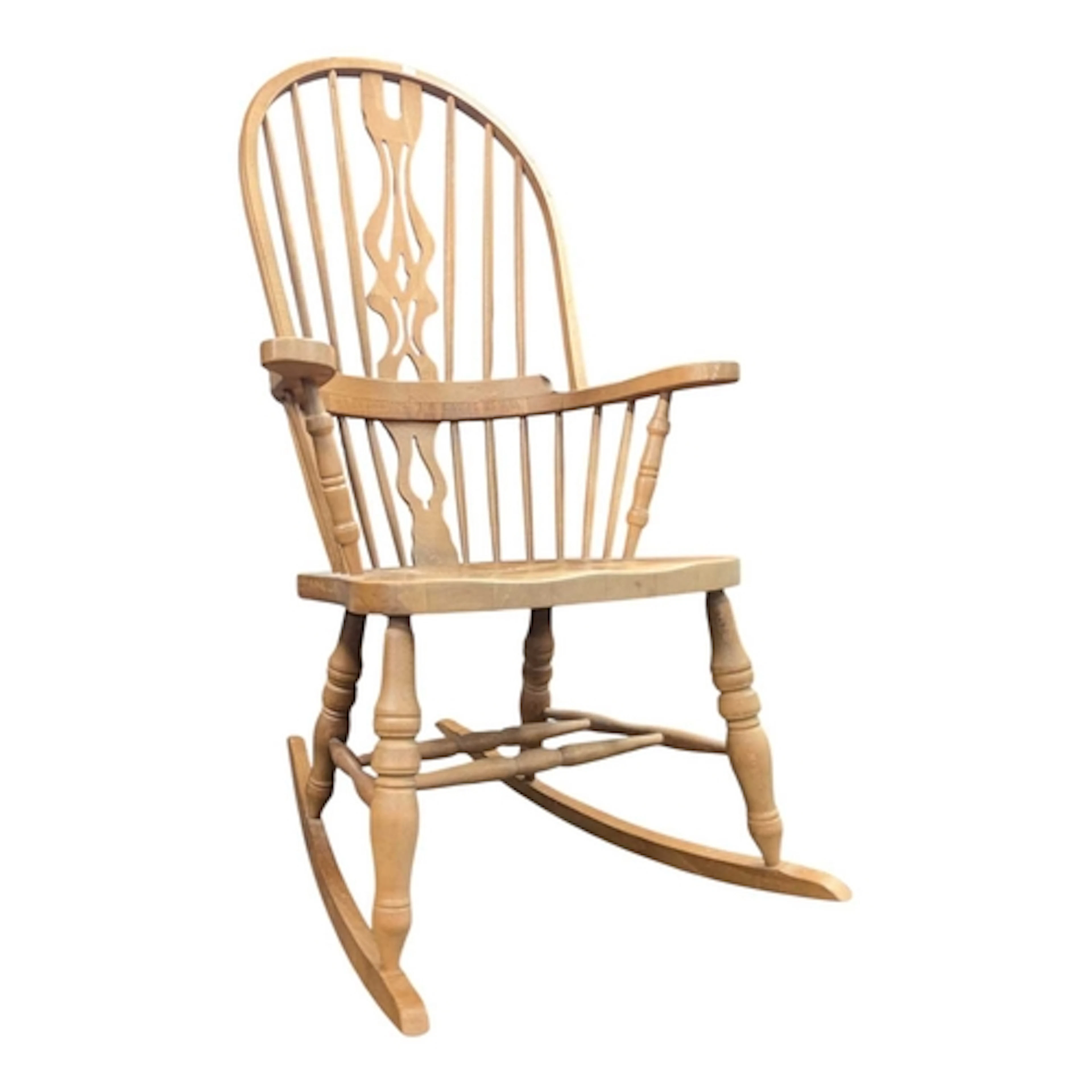 A reproduction Windsor rocking chair. Raised on sleigh runne...