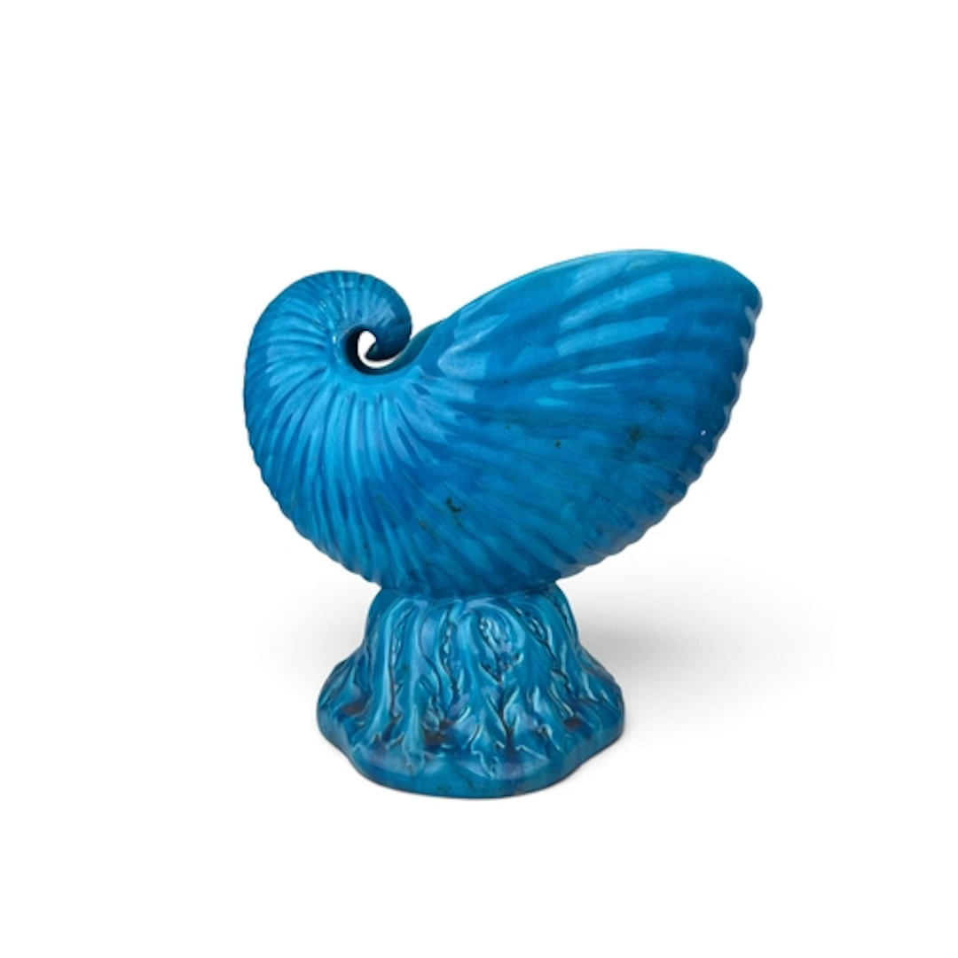 A LARGE MINTONS' NAUTILUS SHELL PLANTER In blue glazed ceram...