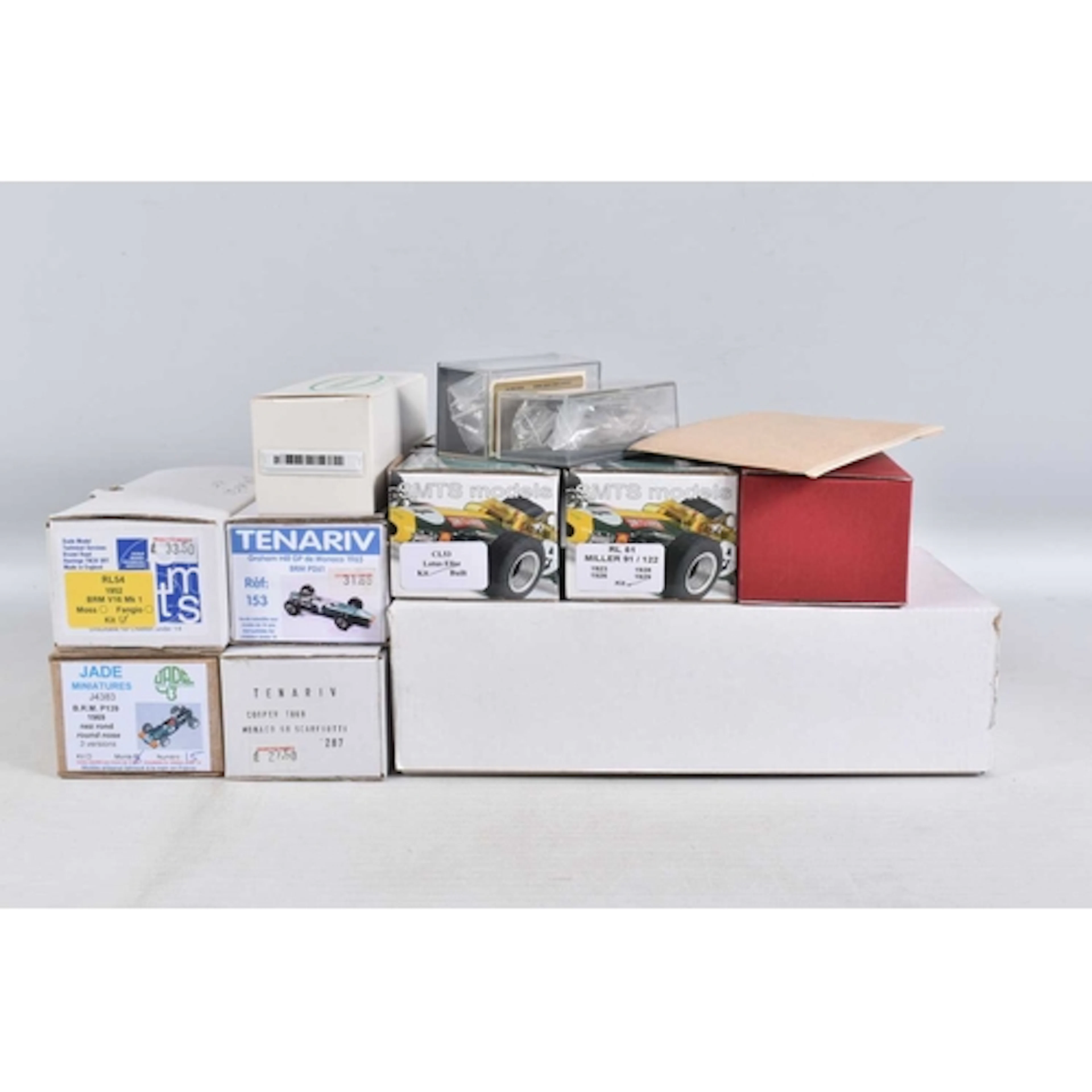 A SELECTION OF ELEVEN MODELS AND MODEL CAR KITS AT 1/43 SCAL...