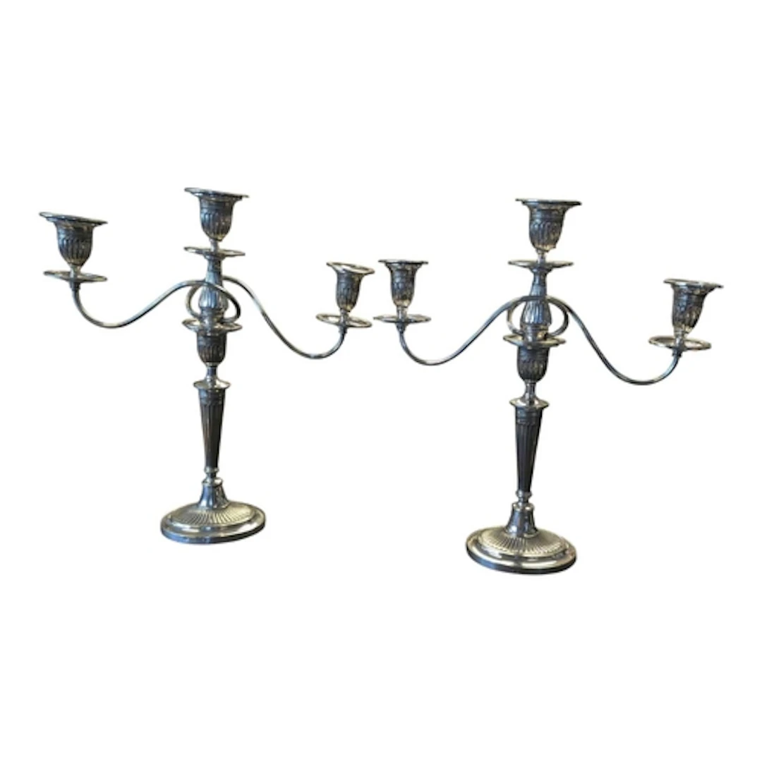 A pair of 20th century silver plated three branch candelabra...