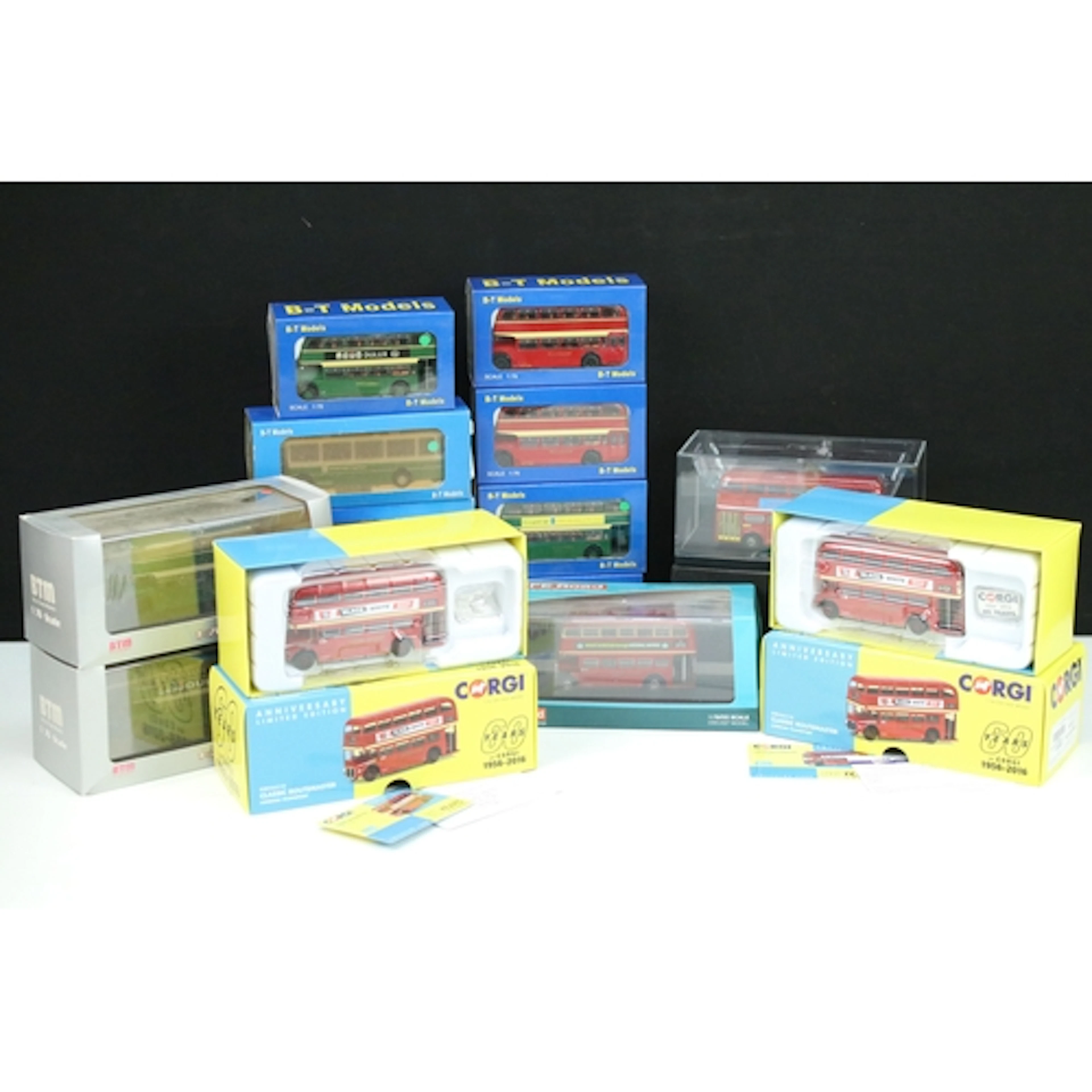 14 Boxed / cased diecast model buses to include 8 x Base Toy...