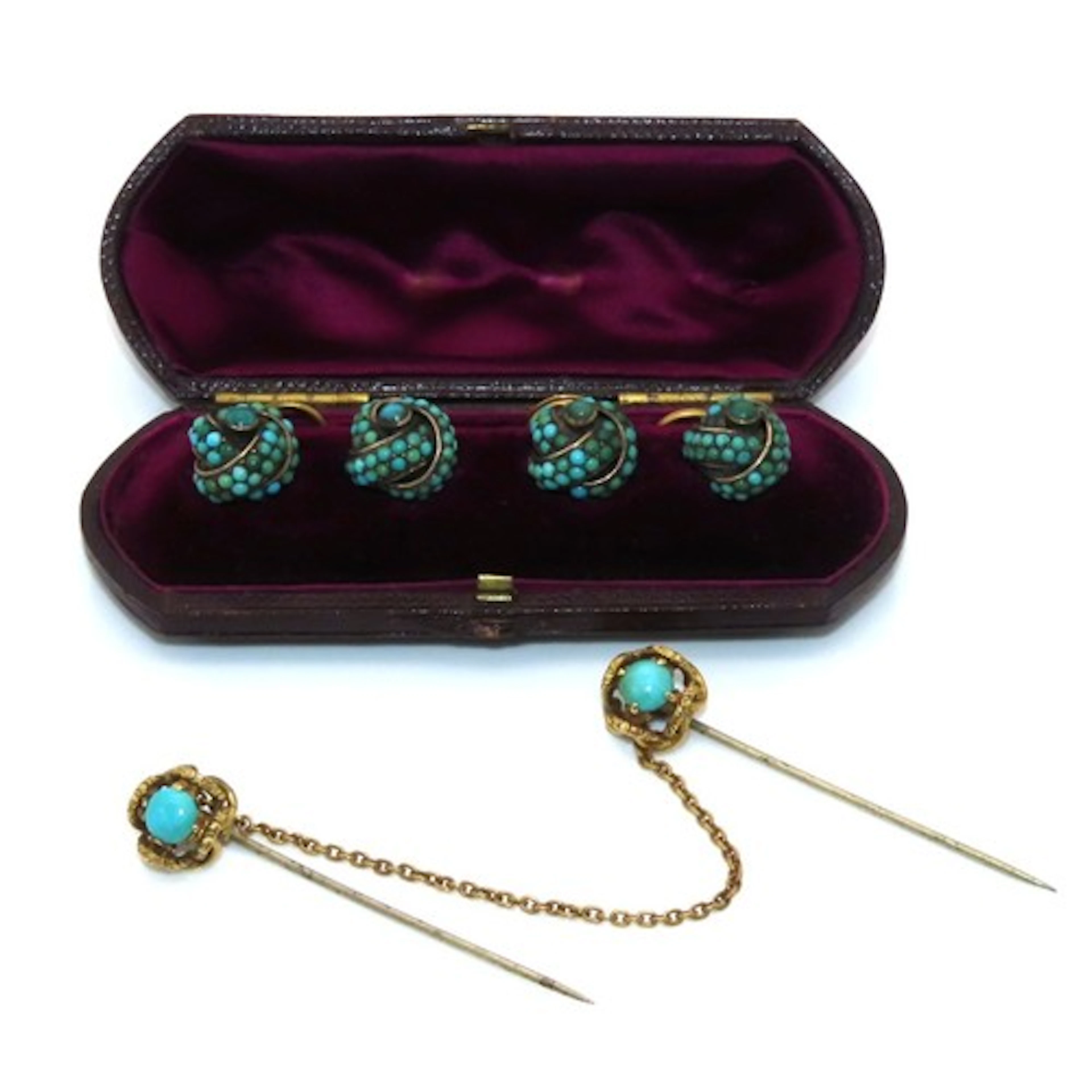 A cased set of four Victorian turquoise buttons, each of sty...