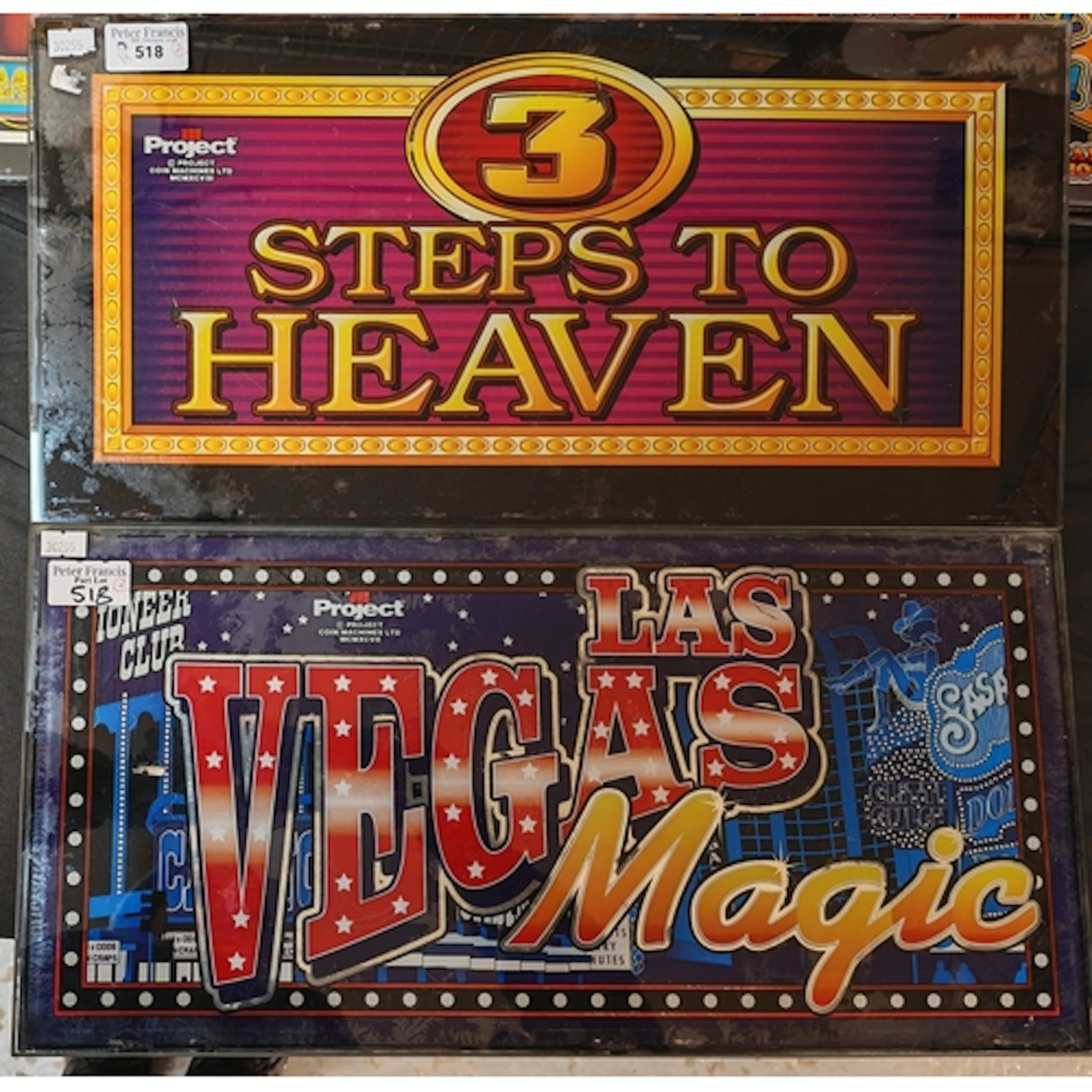 Two vintage style glass coin slot display panels for 'Las Ve...