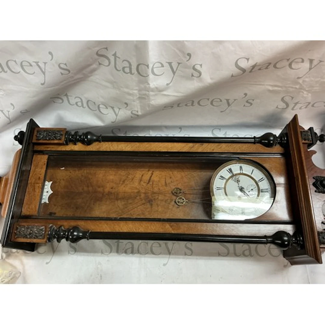 A Two weight Vienna wall clock. 95cm long.