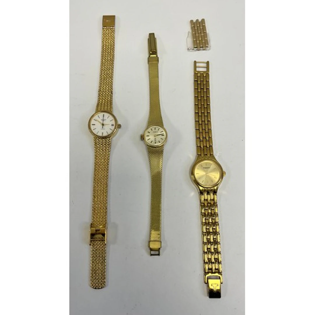 Three assorted ladies watches to include tissot and rotary.