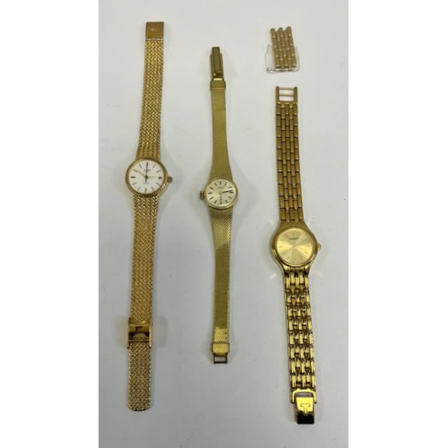 Three assorted ladies watches to include tissot and rotary.