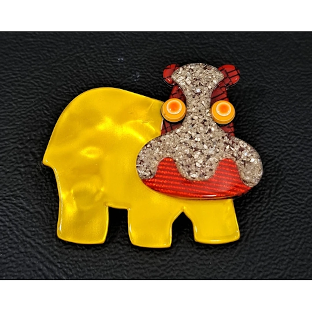 LEA STEIN HIPPO BROOCH with opalescent yellow body and glitt...