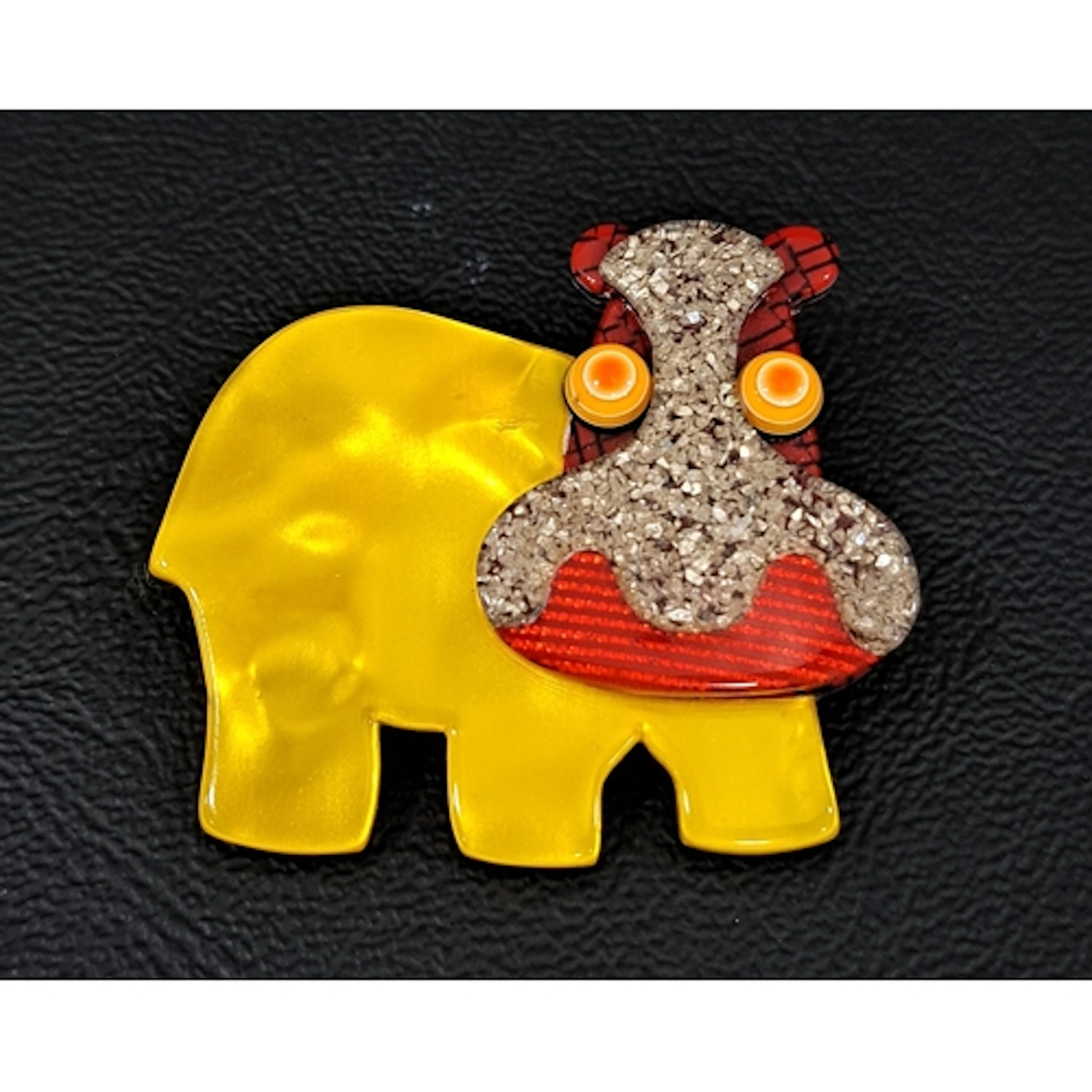 LEA STEIN HIPPO BROOCH with opalescent yellow body and glitt...