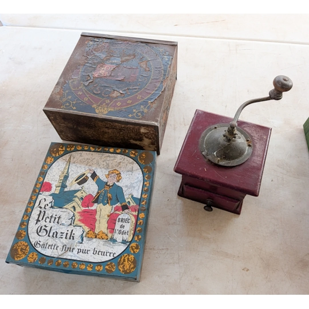 Two vintage biscuits and a coffee grinder