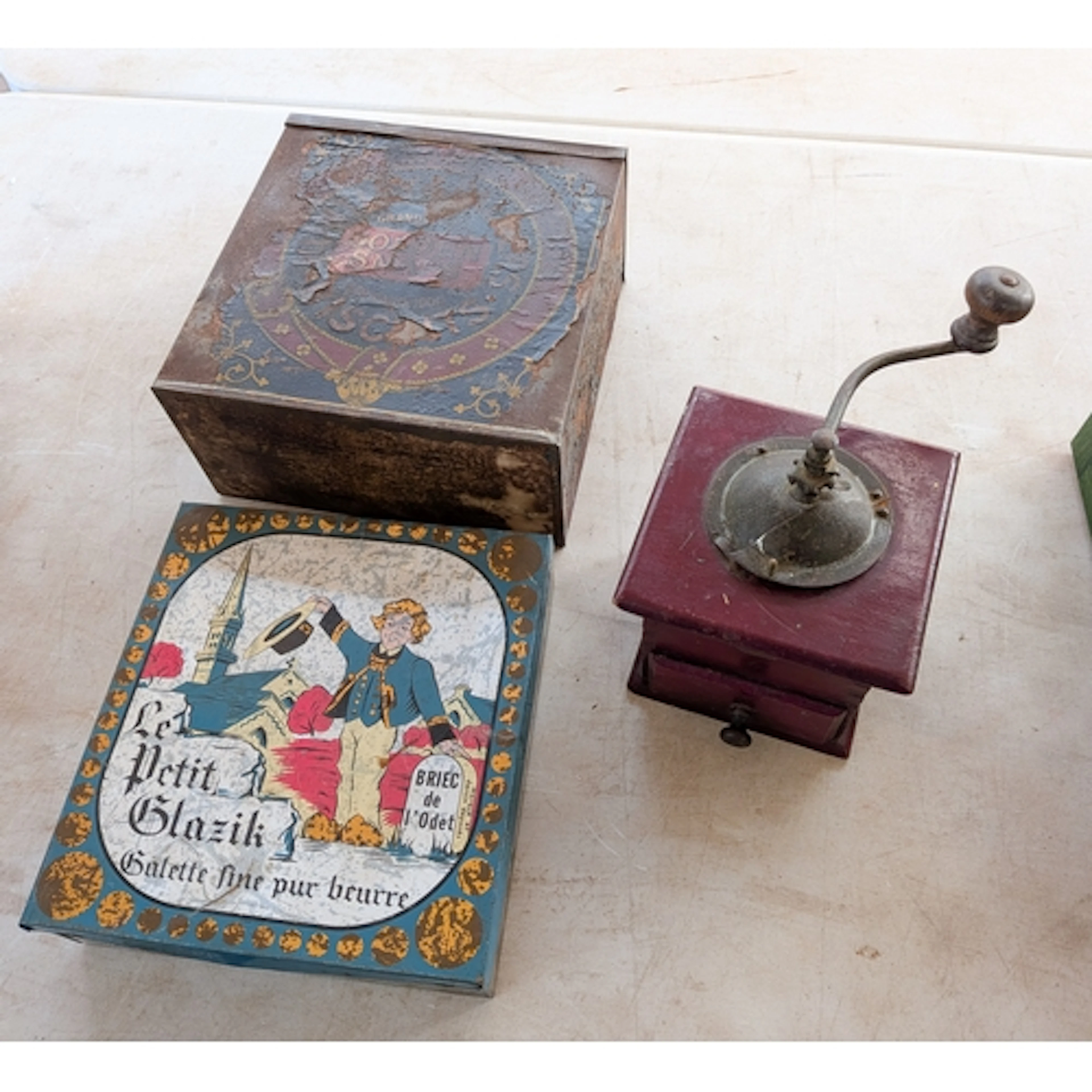 Two vintage biscuits and a coffee grinder