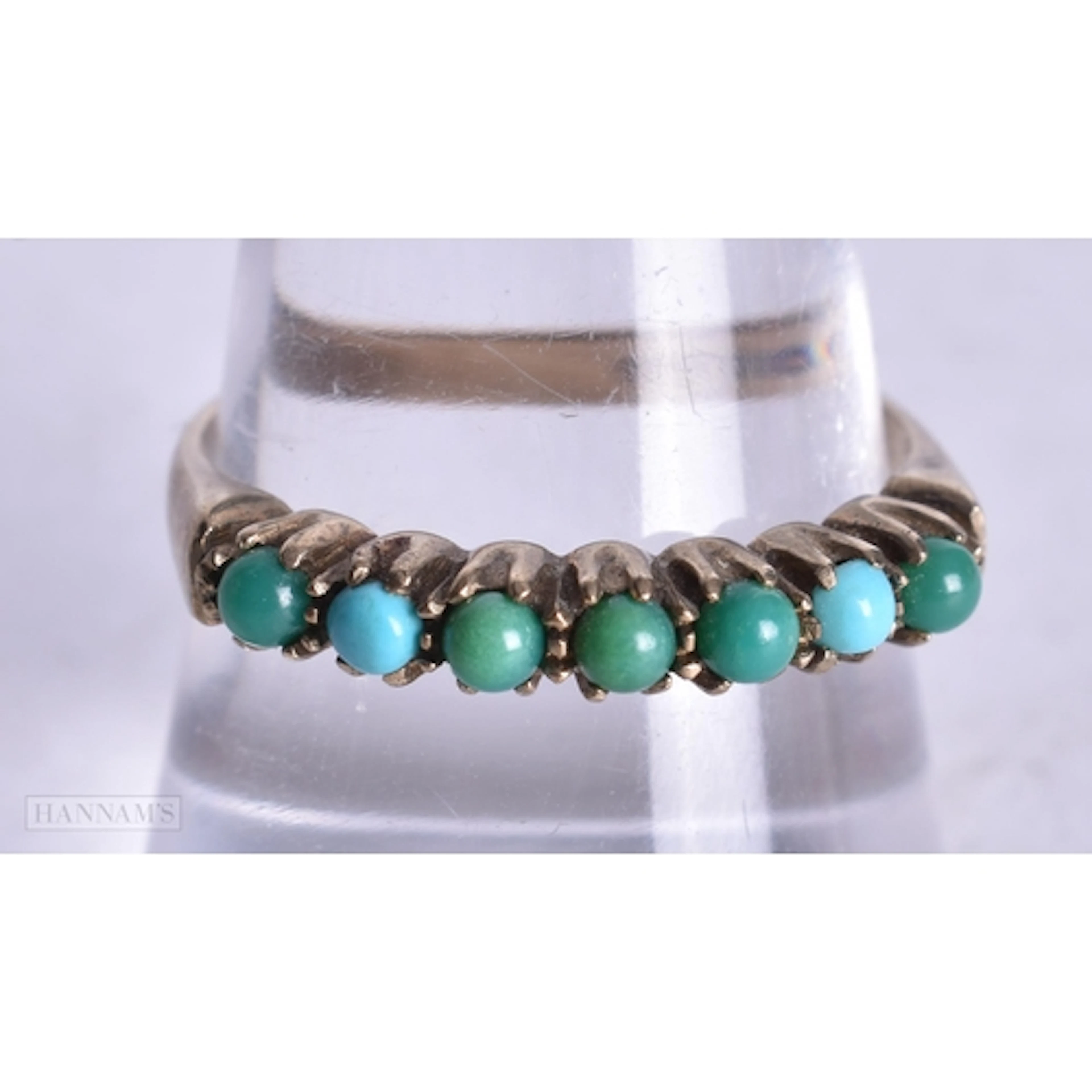 9ct gold turquoise half eternity ring (2g). Q.