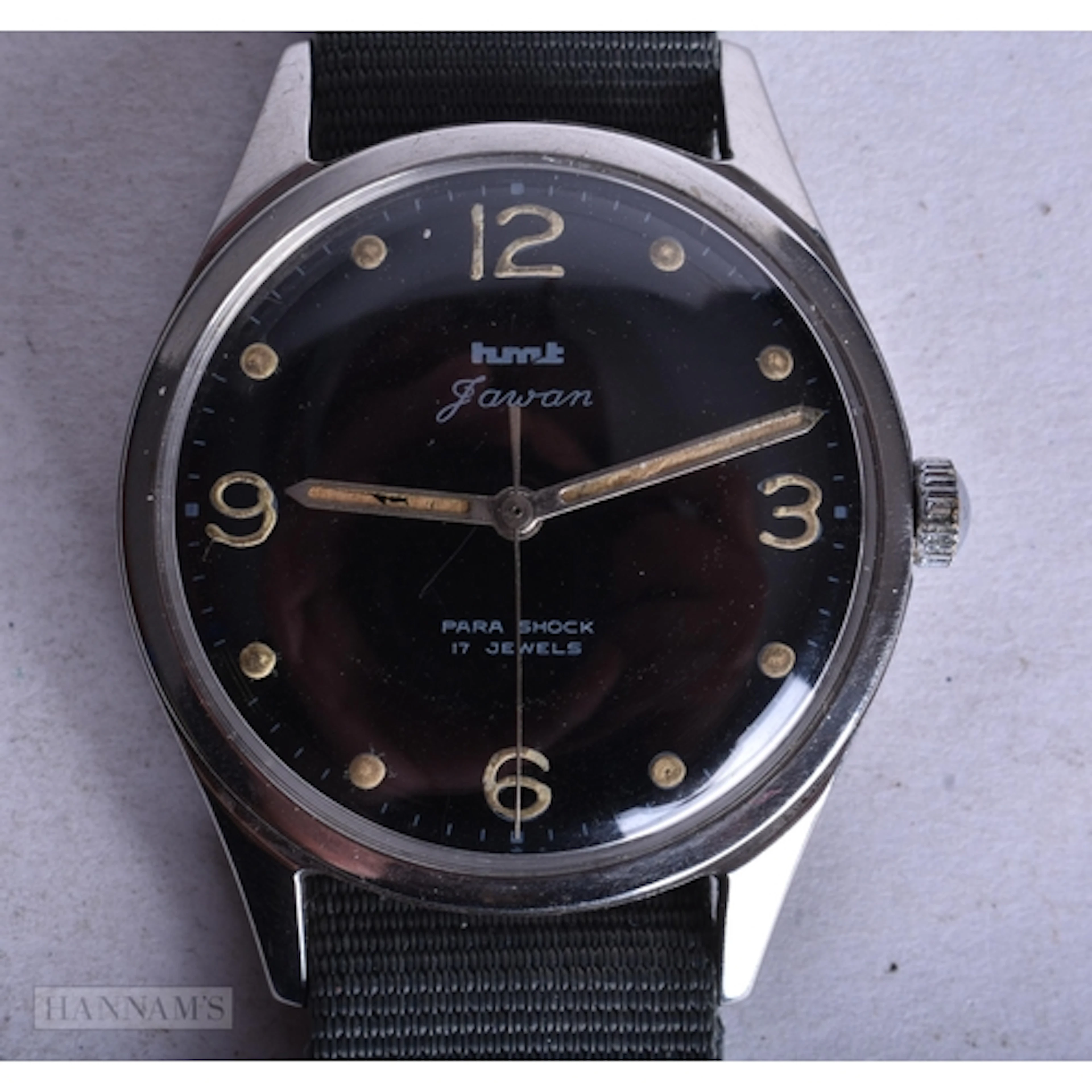 AN HMT PARA SHOCK MILITARY WRIST WATCH. Running. 3.25 cm wid...