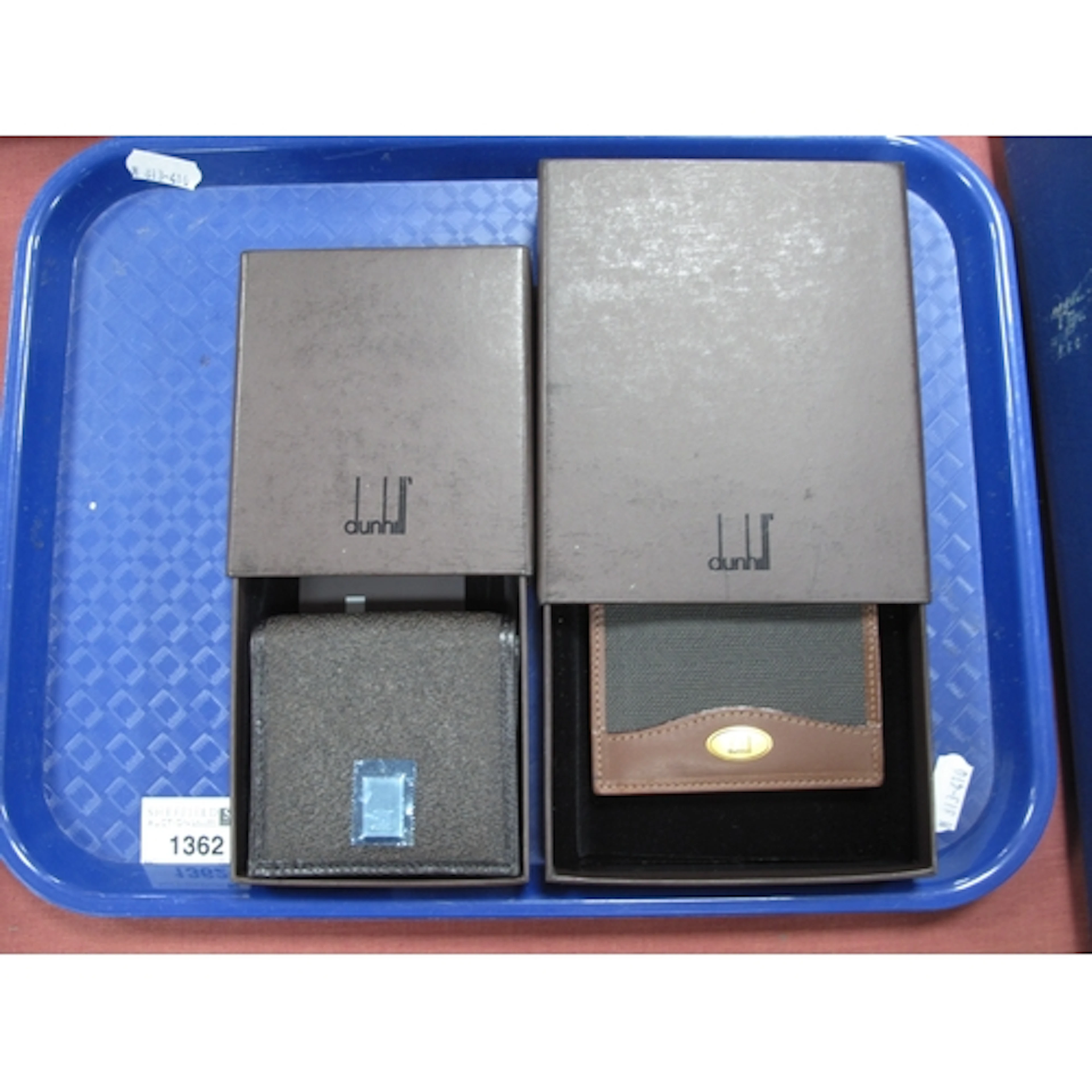 Dunhill leather bifold wallet with tartan patterned interior...