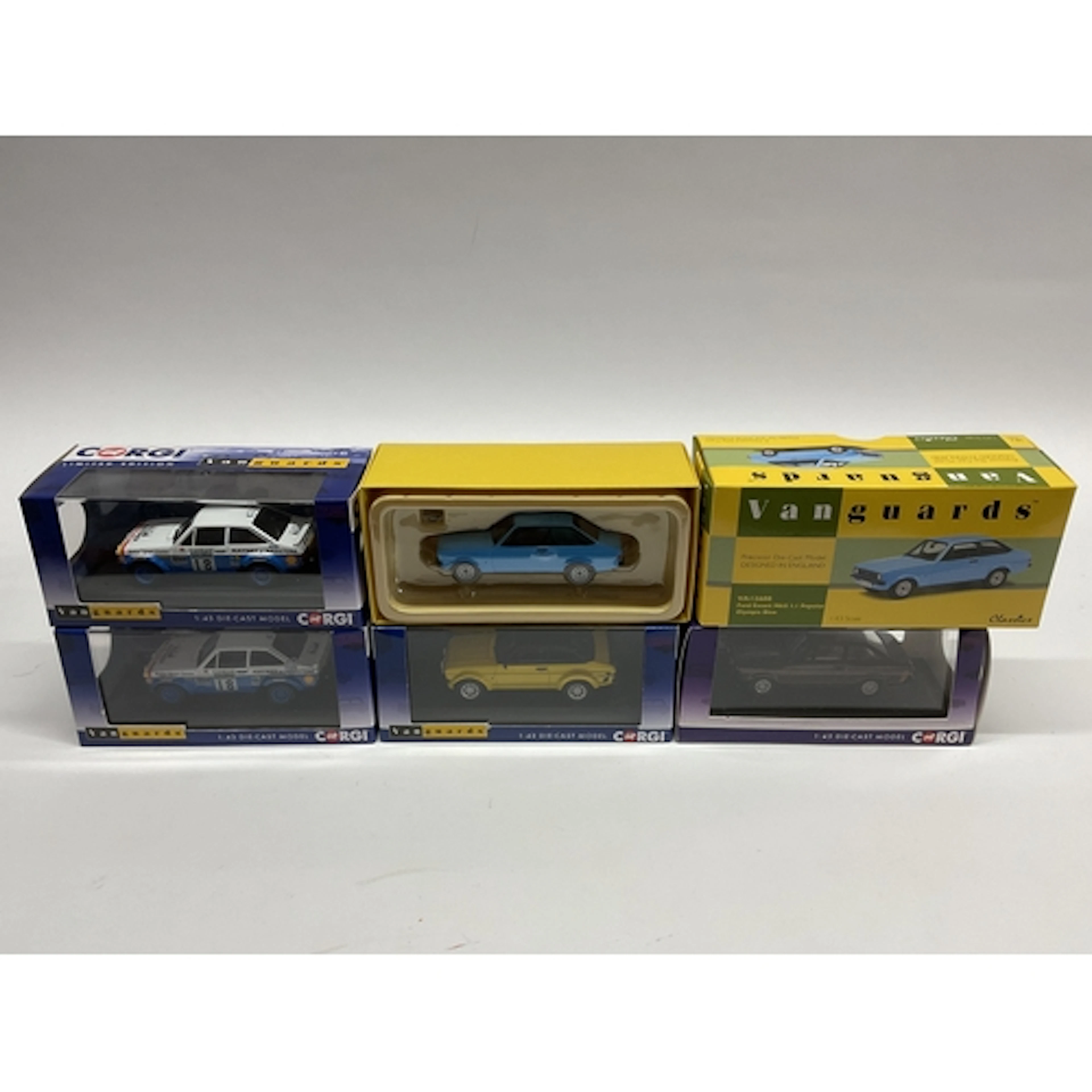 Five Corgi, Lledo Vanguards 1:43 scale diecast model Ford Es...