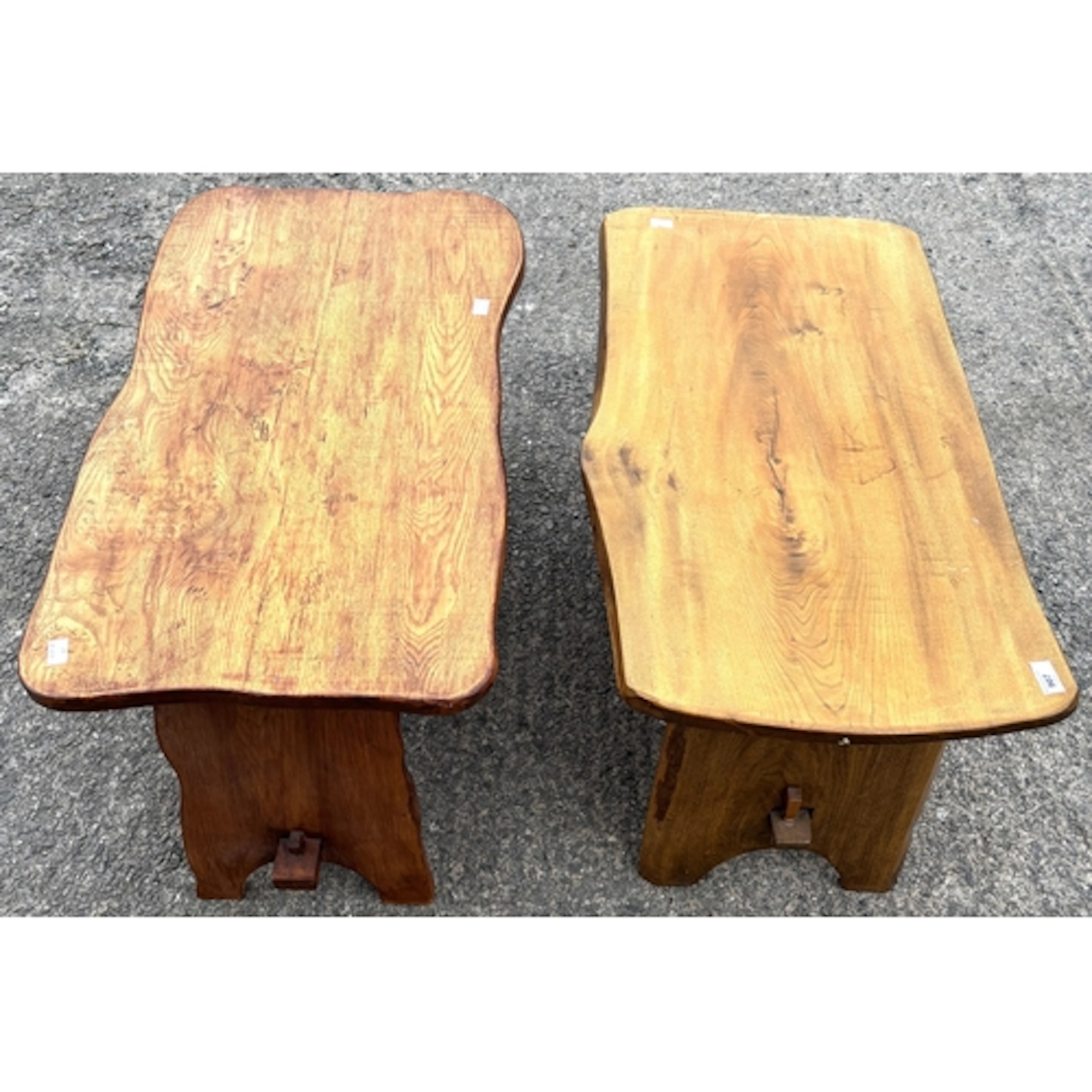 A pair of rustic coffee tables.