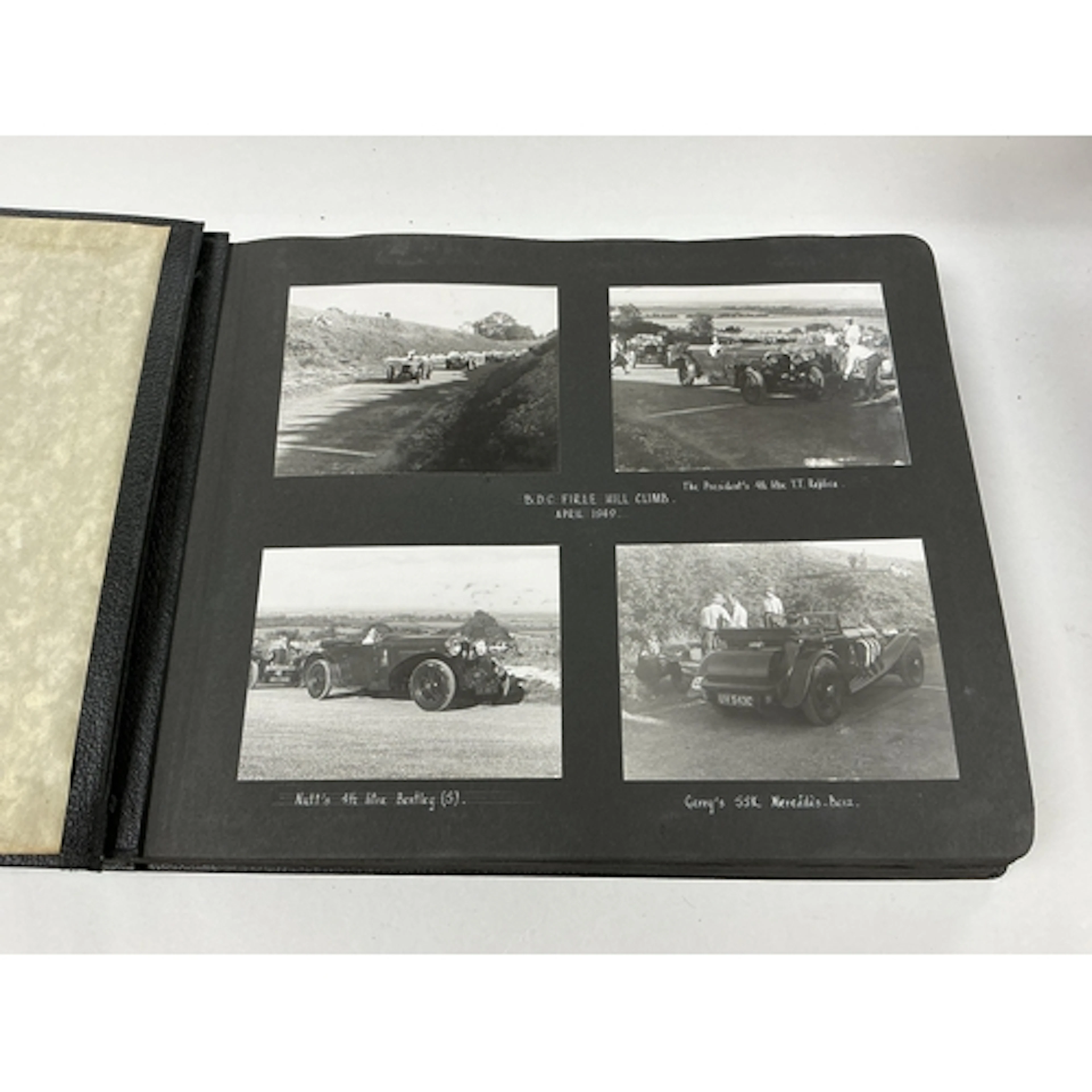 A 1950s photograph album of motor racing containing photogra...