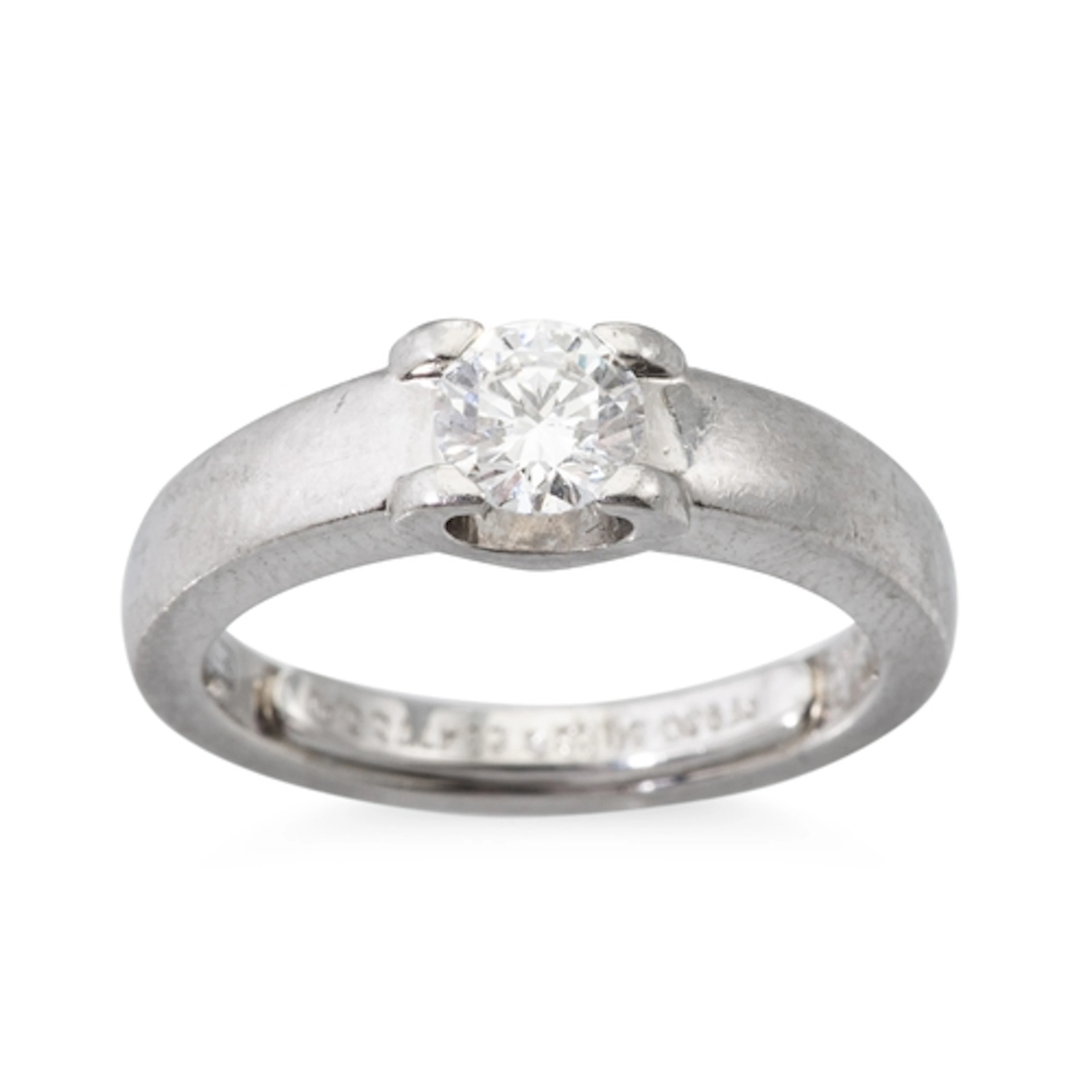 A CARTIER DIAMOND RING, signed Cartier, stamped 950 for plat...
