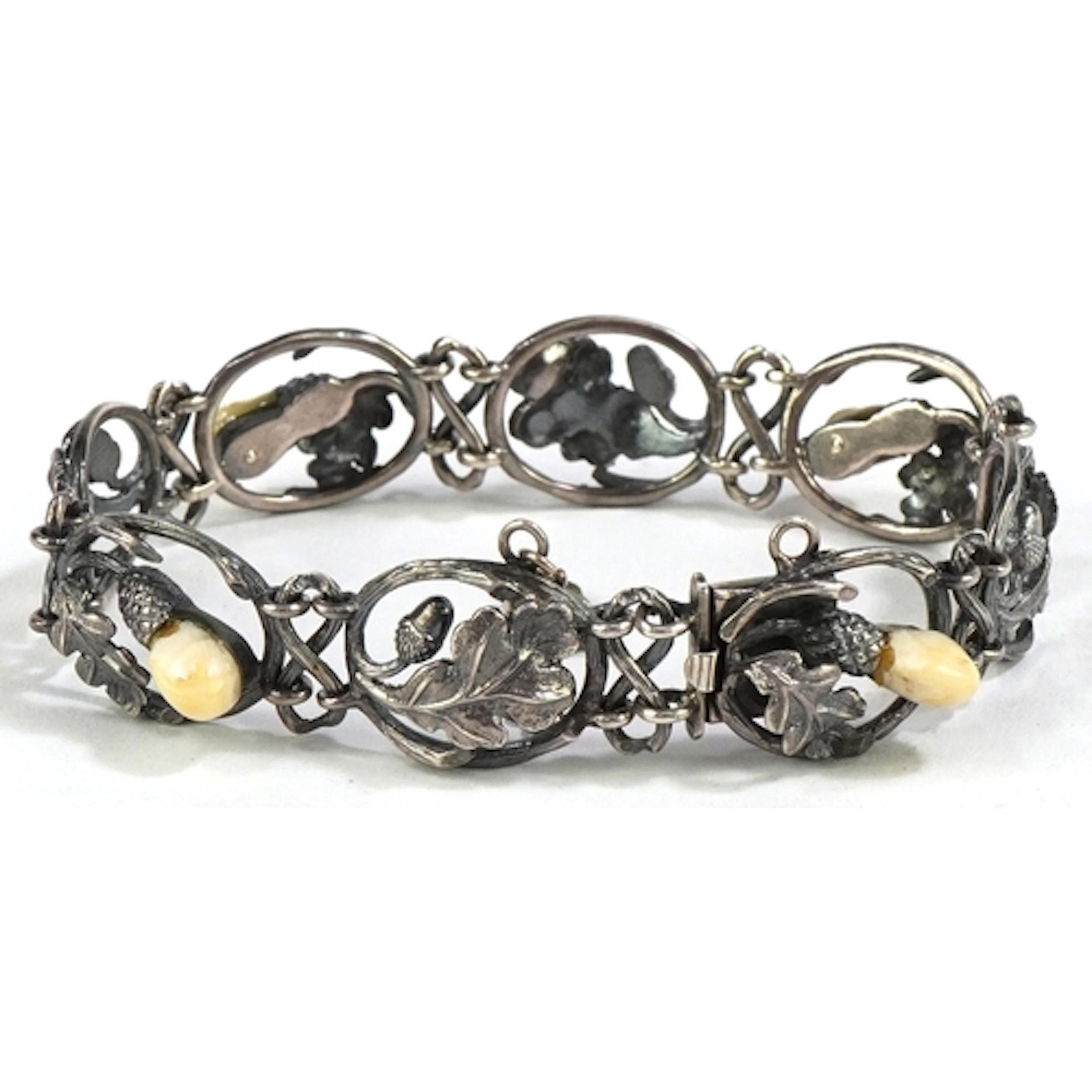 German silver panel bracelet pierced with acorns and set wit...