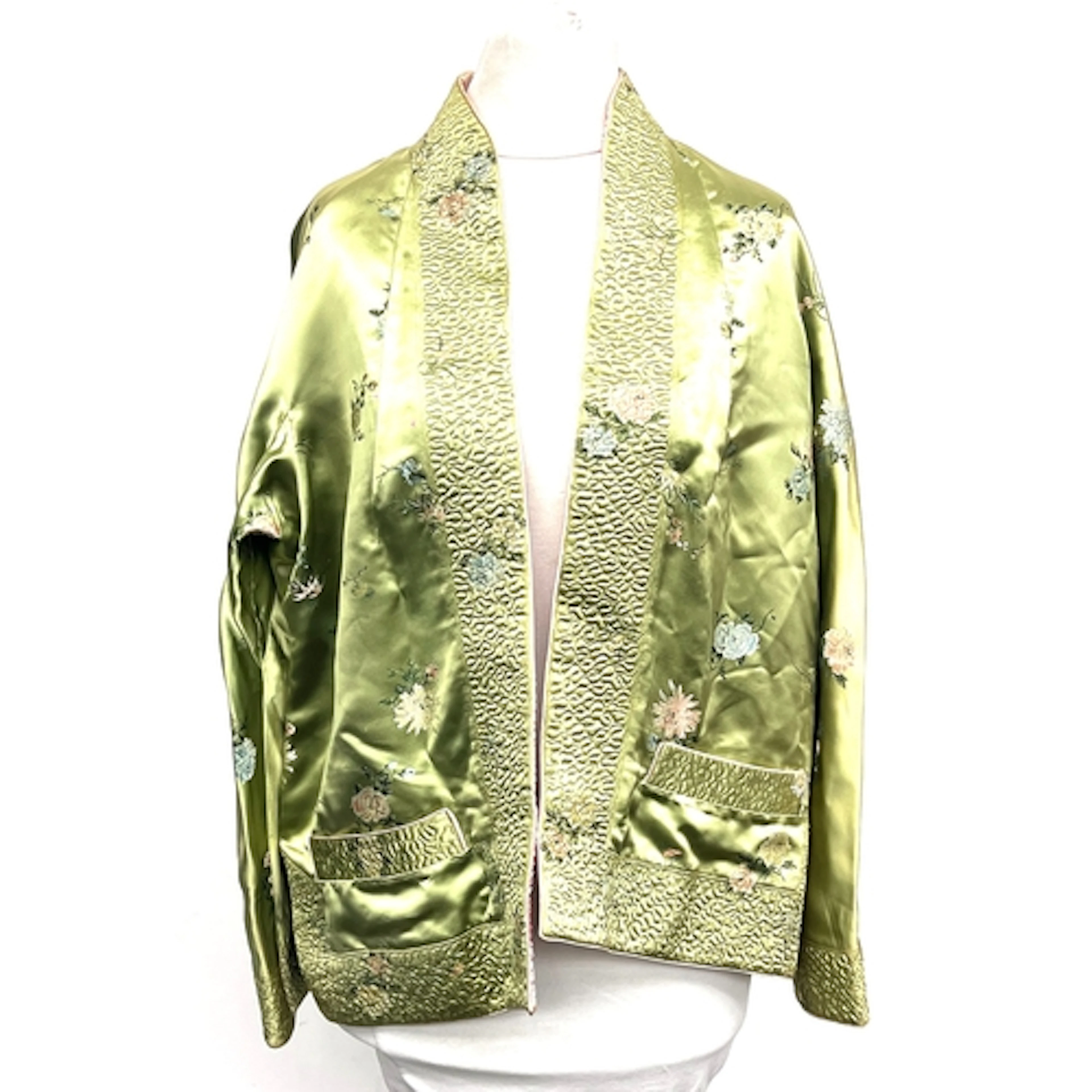 A Chinese reversible green and pink florally embroidered sil...