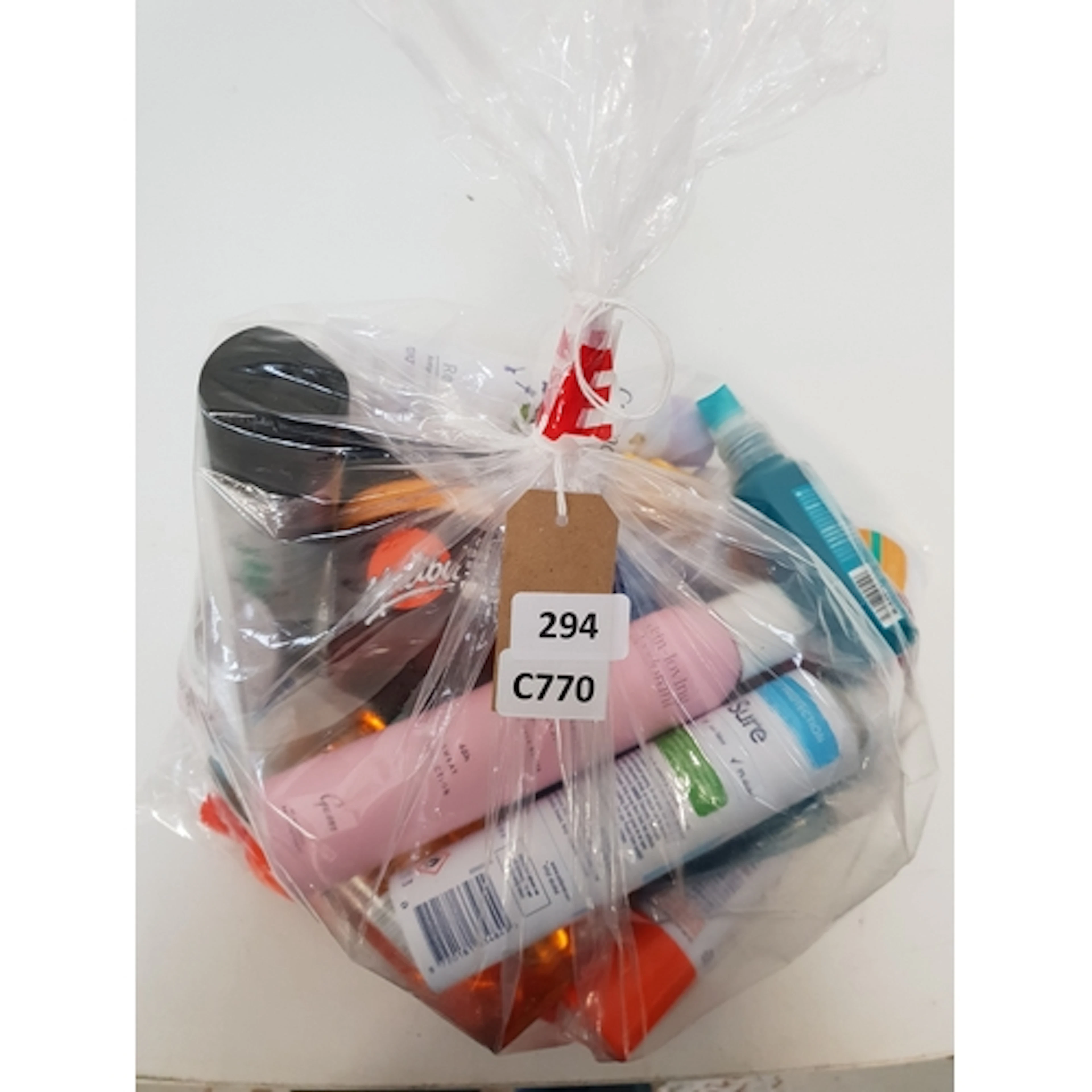 ONE BAG OF USED COSMETICS Including Malibu, John Frida, Sur...