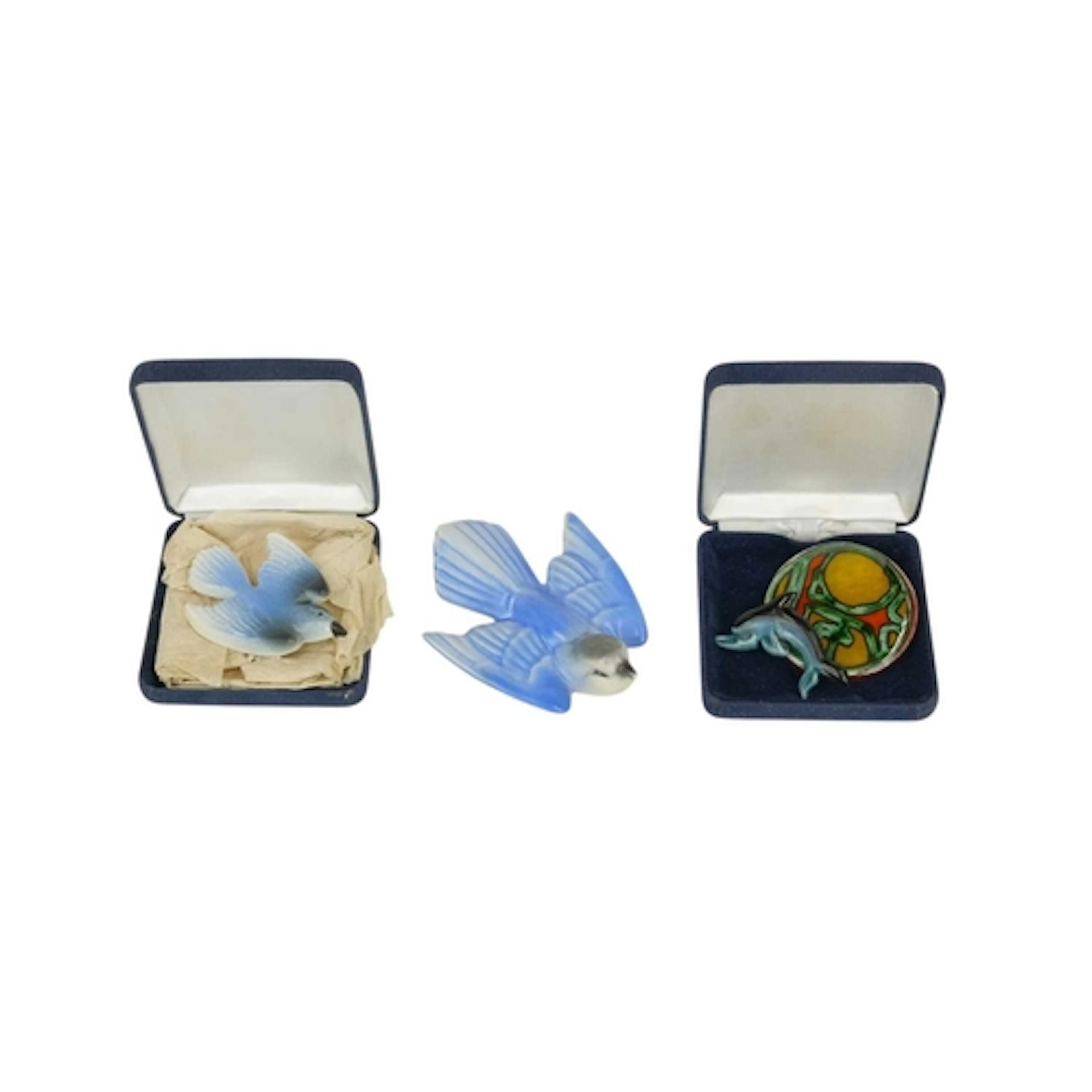 Poole Pottery - Brooches. A limited edition bluebird brooch,...