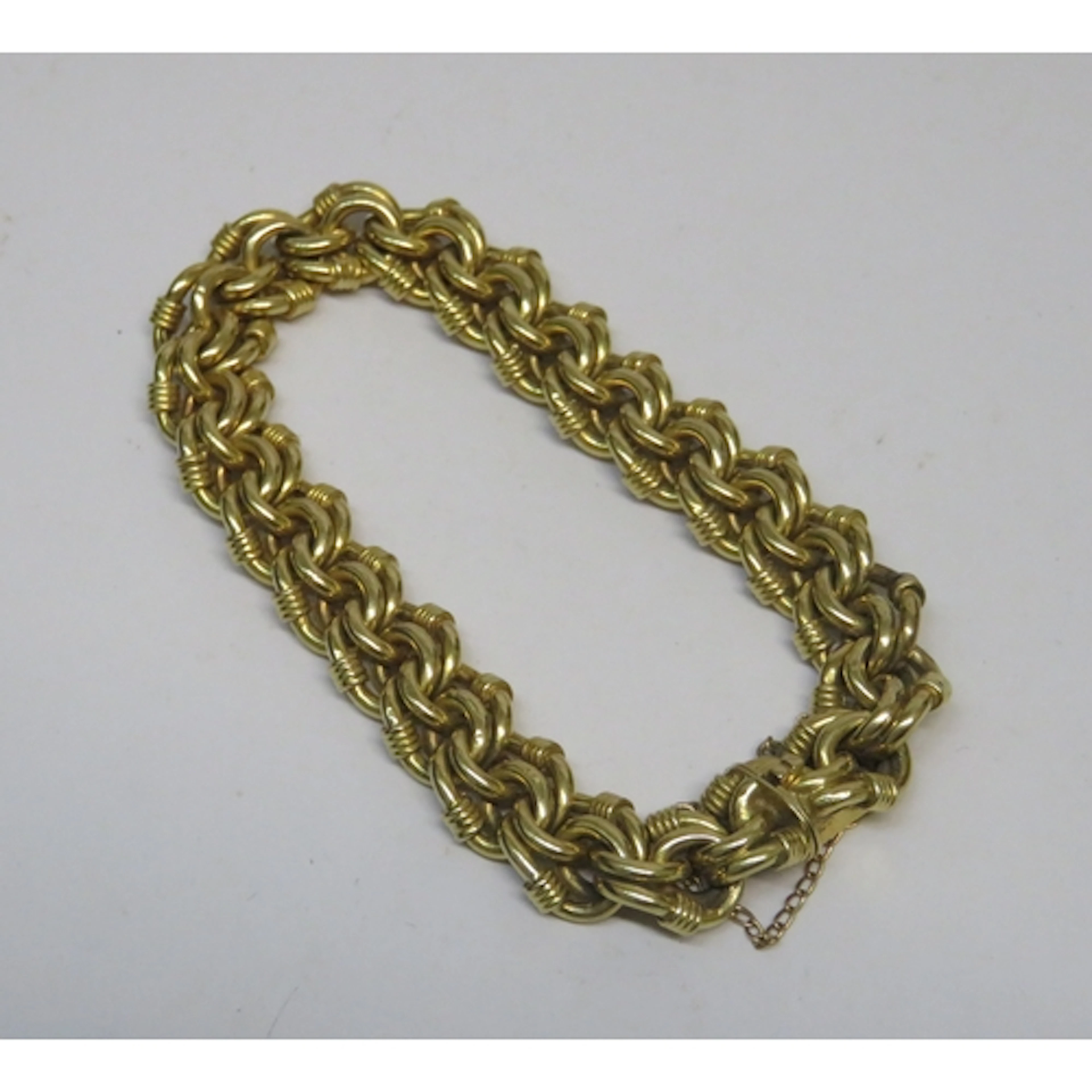 Continental 18ct gold chain link bracelet, 24g