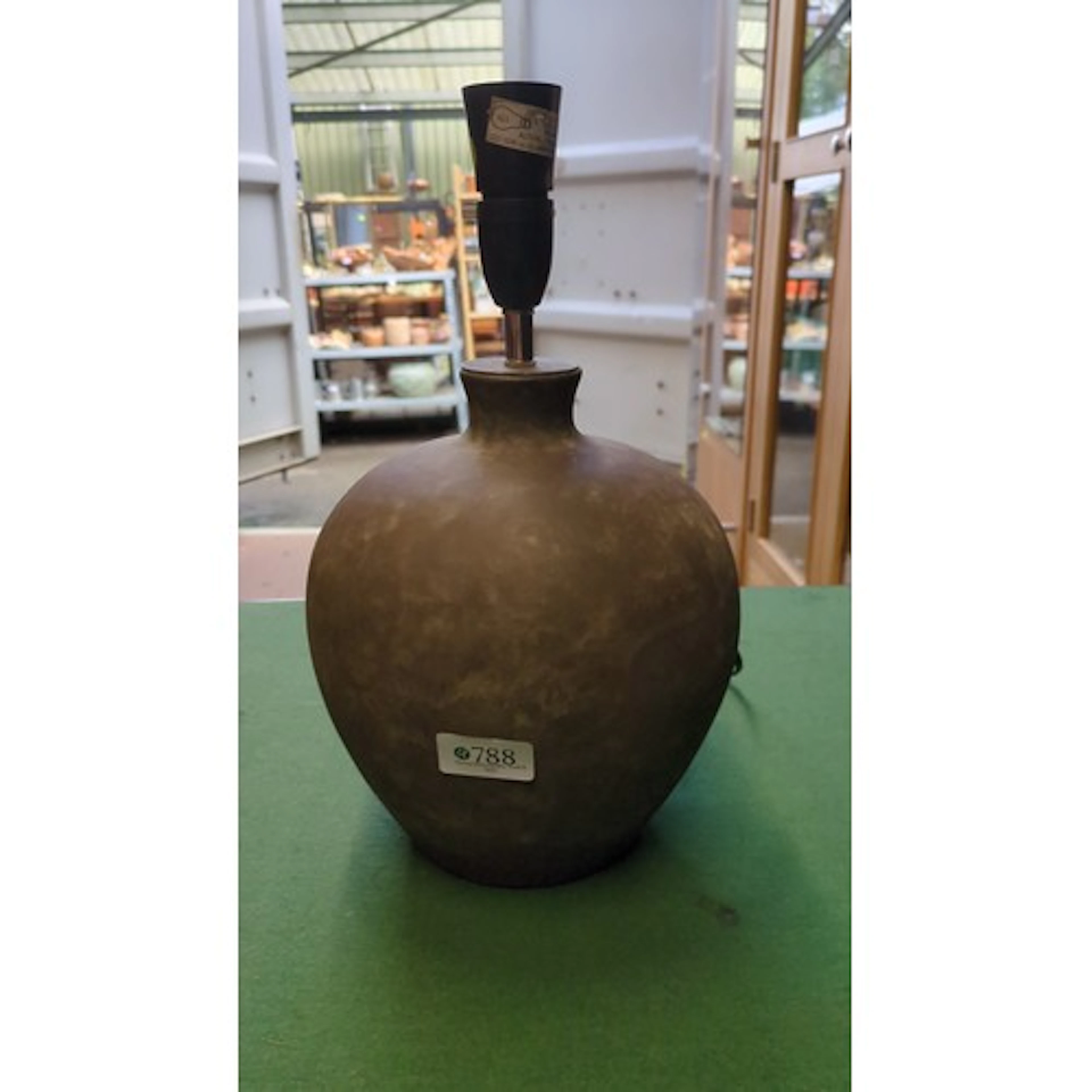Dunelm spherical table lamp, of dark metal form with short n...