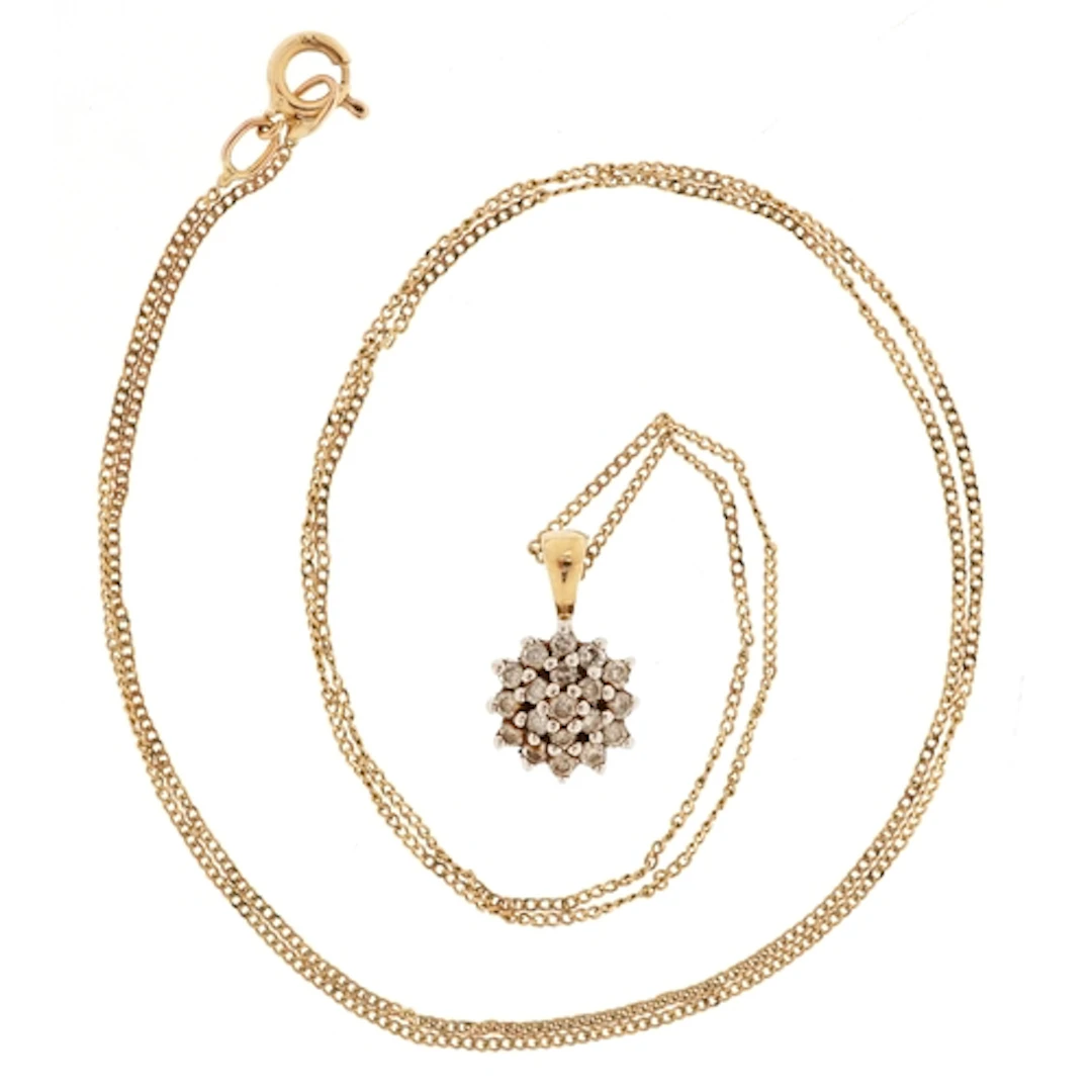 9ct gold diamond three tier cluster pendant on a 9ct gold ne...