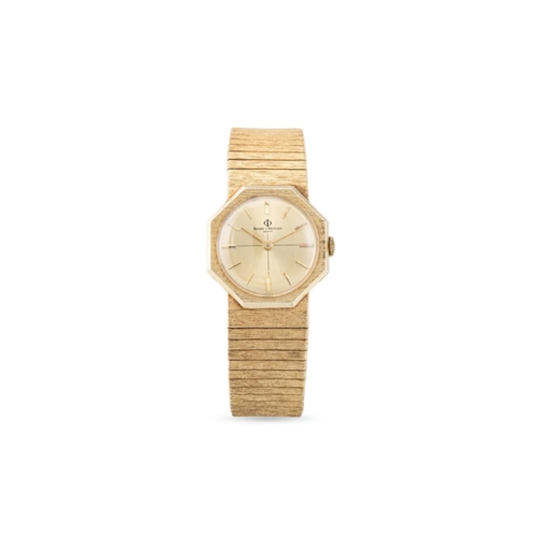 A VINTAGE BAUME MERCIER 14CT GOLD WRIST WATCH, octagonal fac...