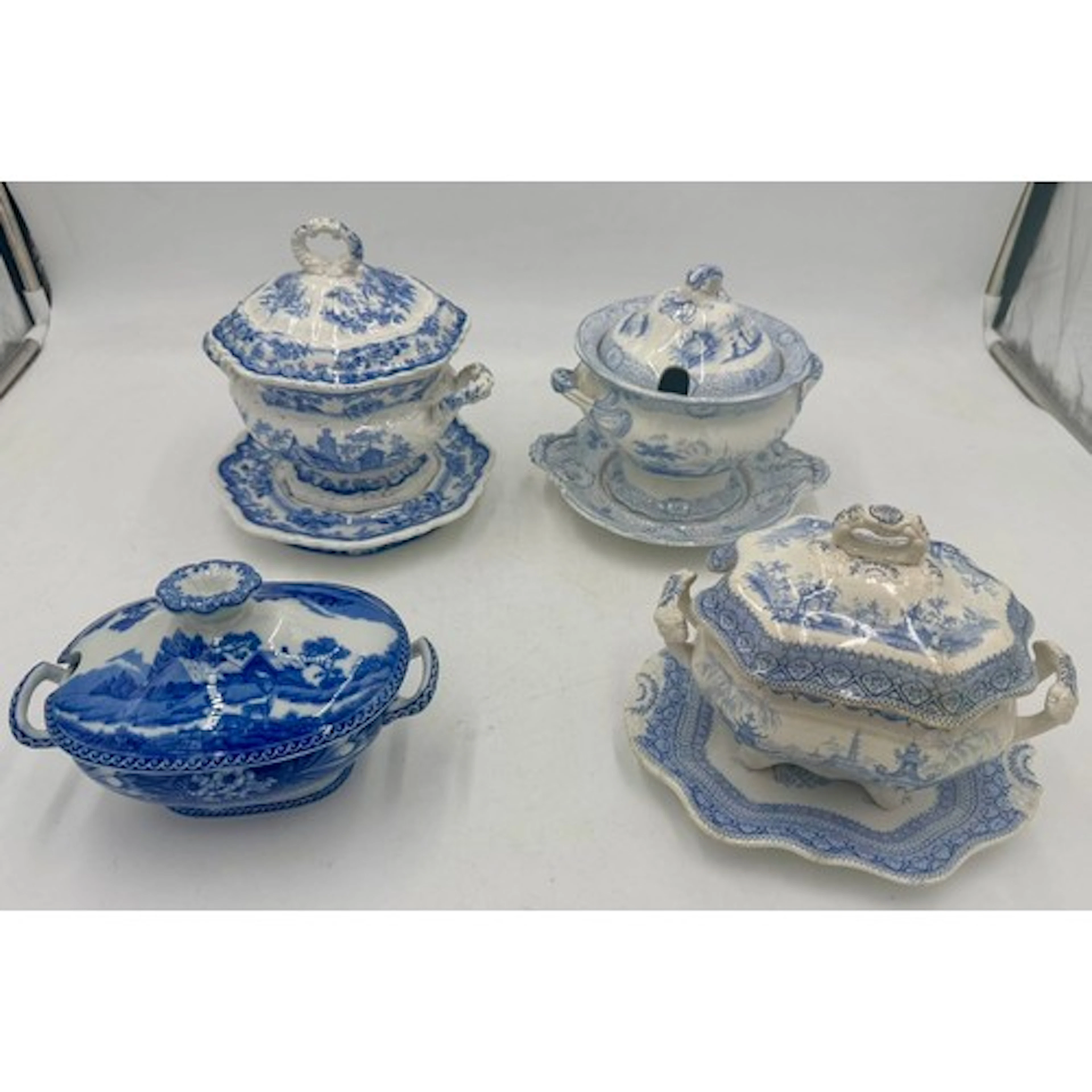 Three early 19th century blue and white transfer-printed sau...