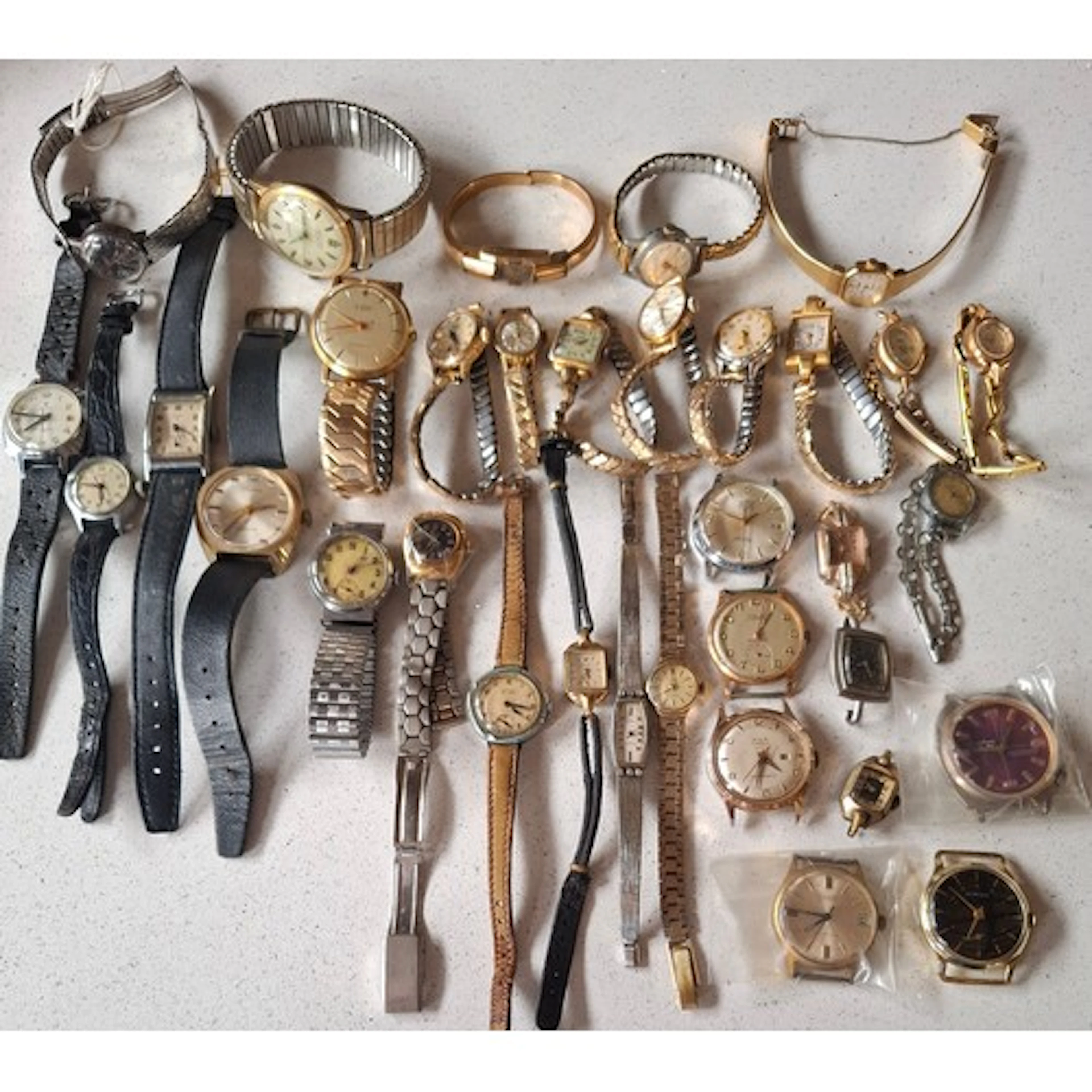 A quantity of vintage watches and watch dials to include a S...
