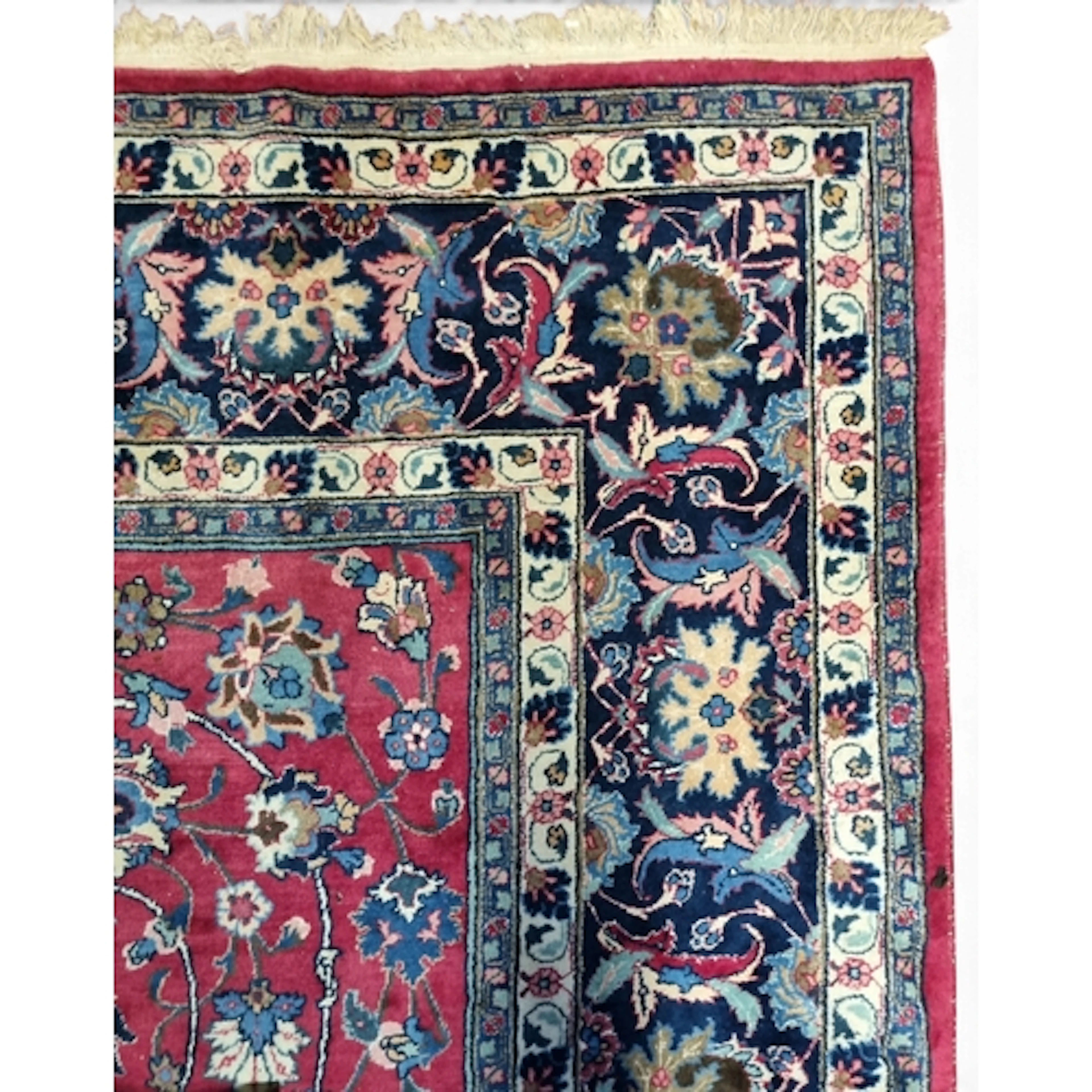 A large Persian Carpet with red and blue ground and unique c...