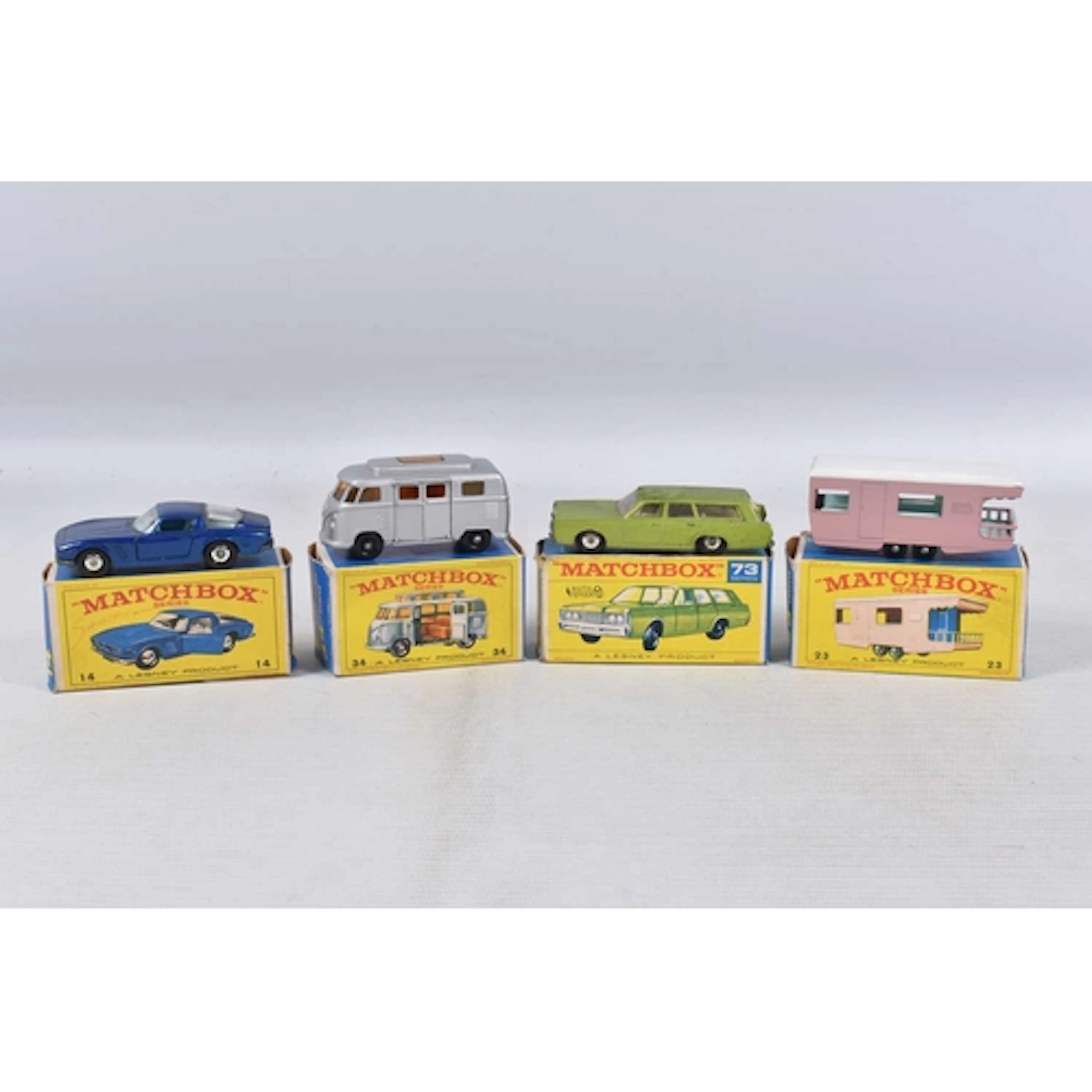 FOUR BOXED MATCHBOX 1-75 SERIES REGULAR WHEELS MODELS, Iso G...