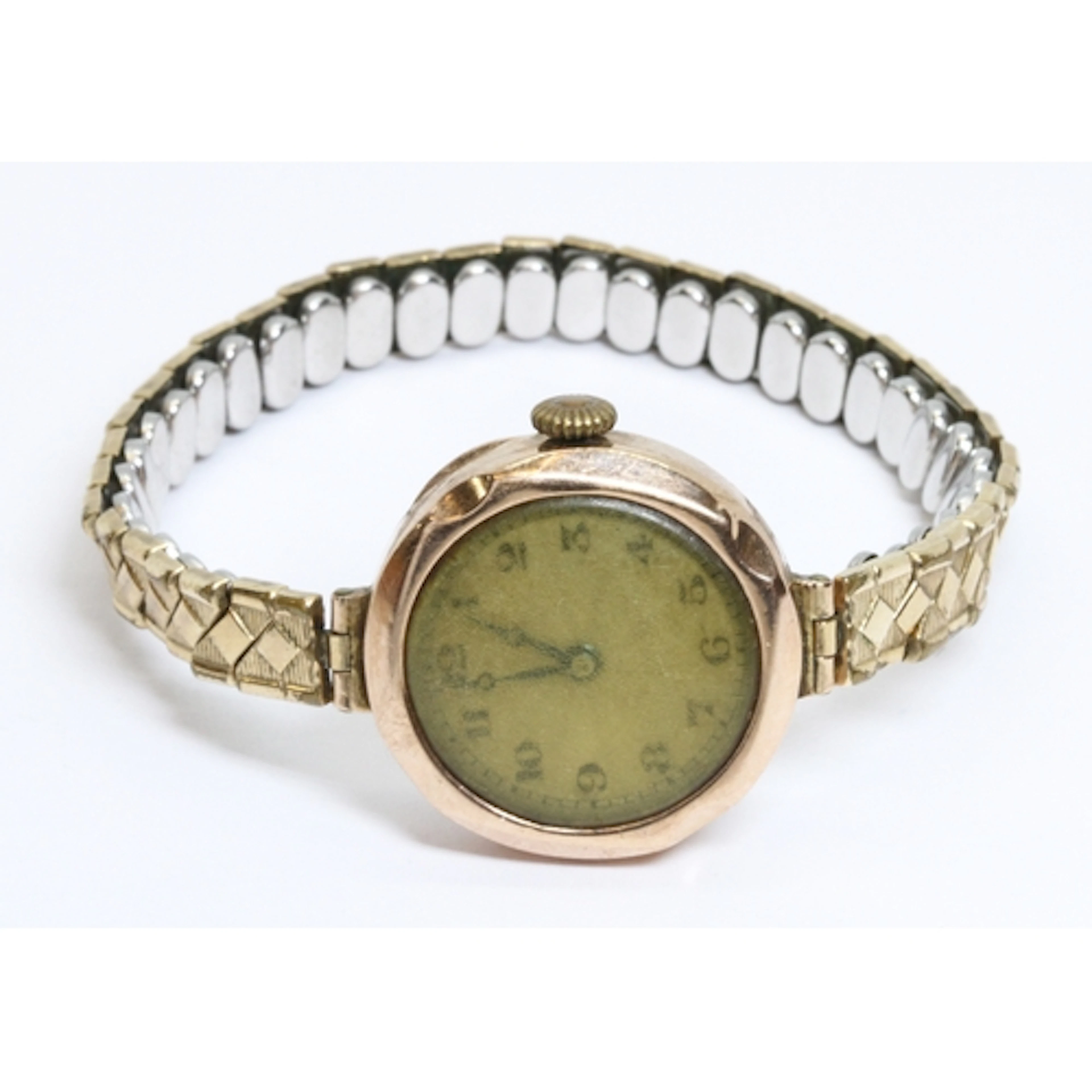 A ladies 9ct gold wristwatch, gold plated flexi strap.