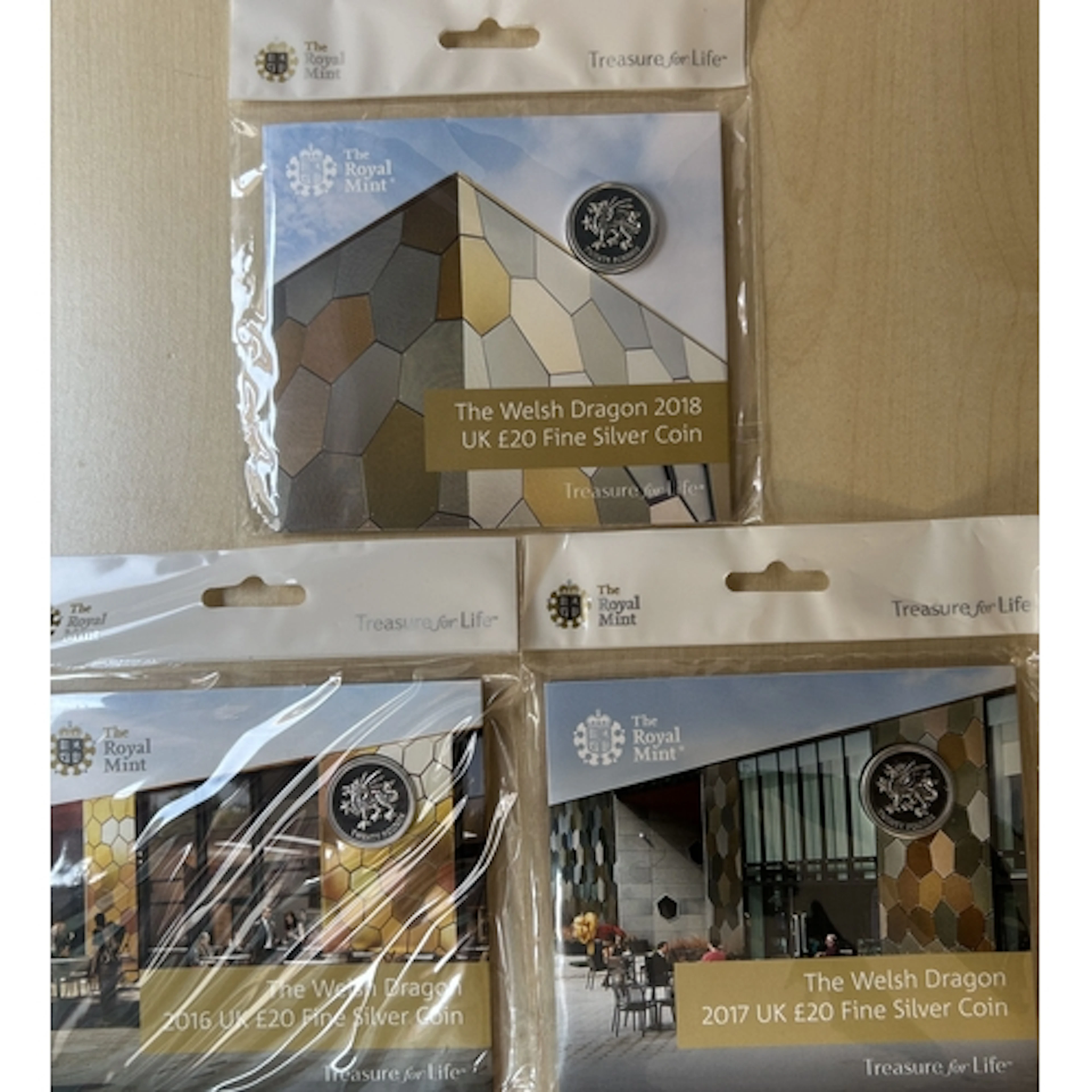 A group of three UK Queen Elizabeth II Royal Mint brilliant ...