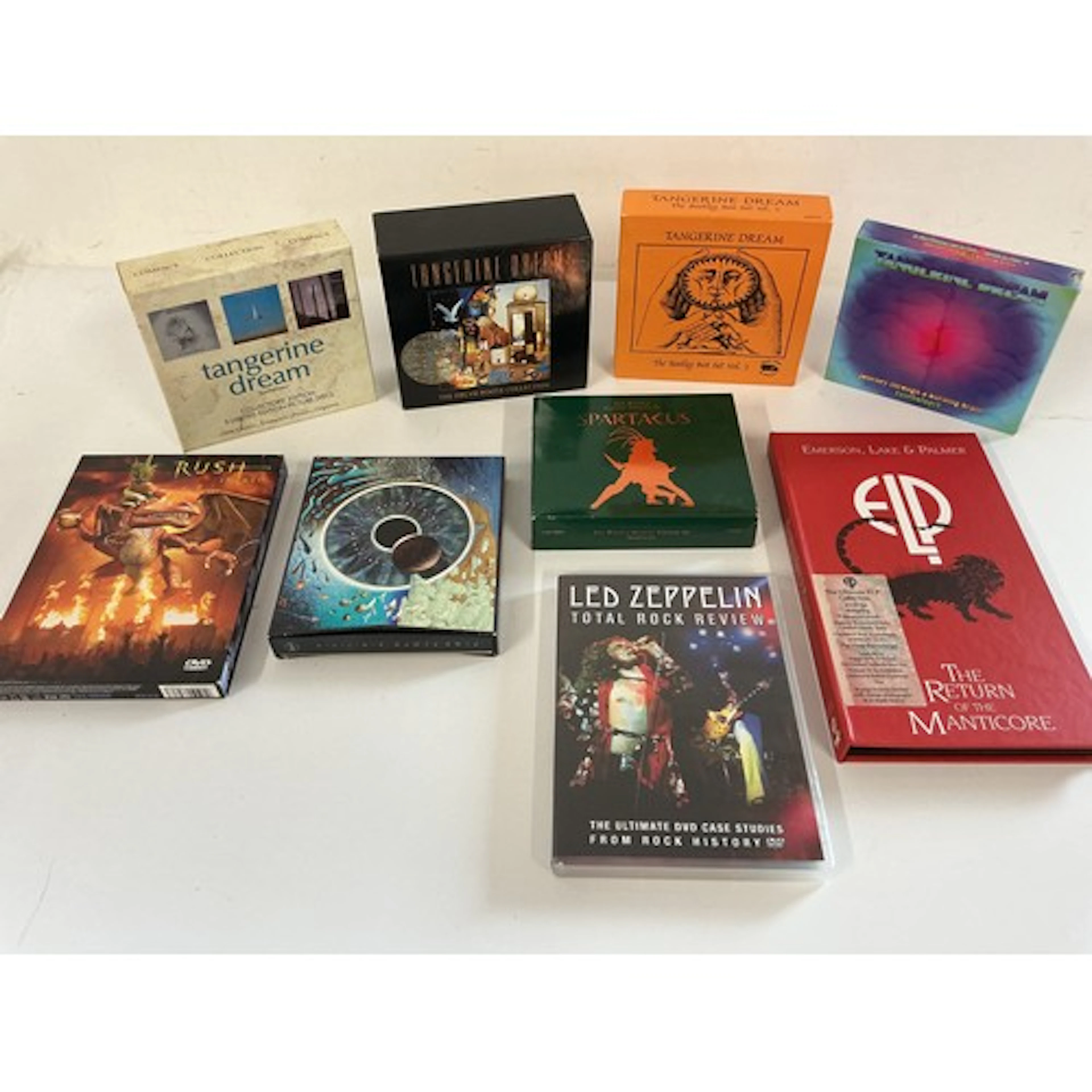 A collection of CD box sets and DVDs by various artists incl...