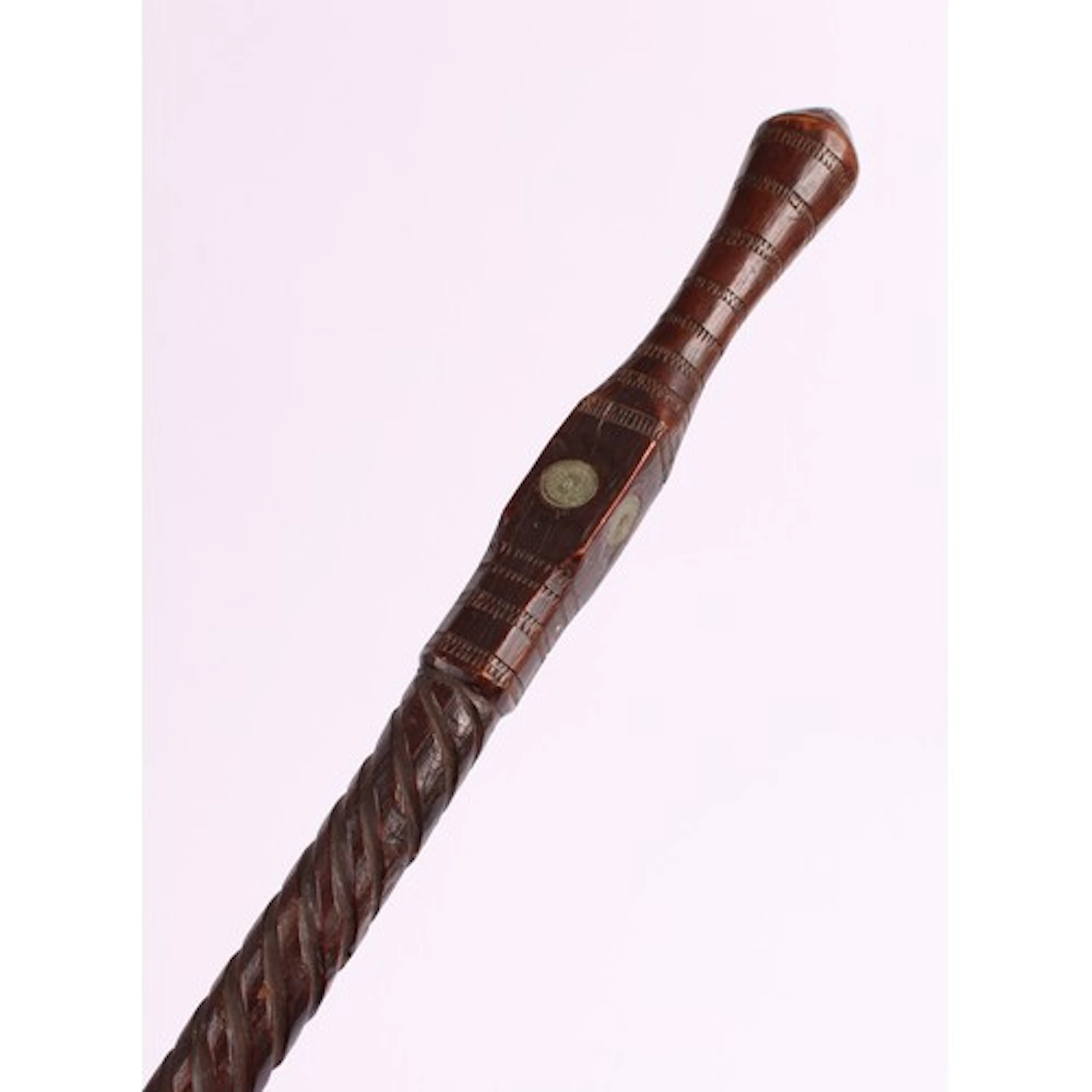 A folk art walking stick or cane, set with Middle Eastern co...