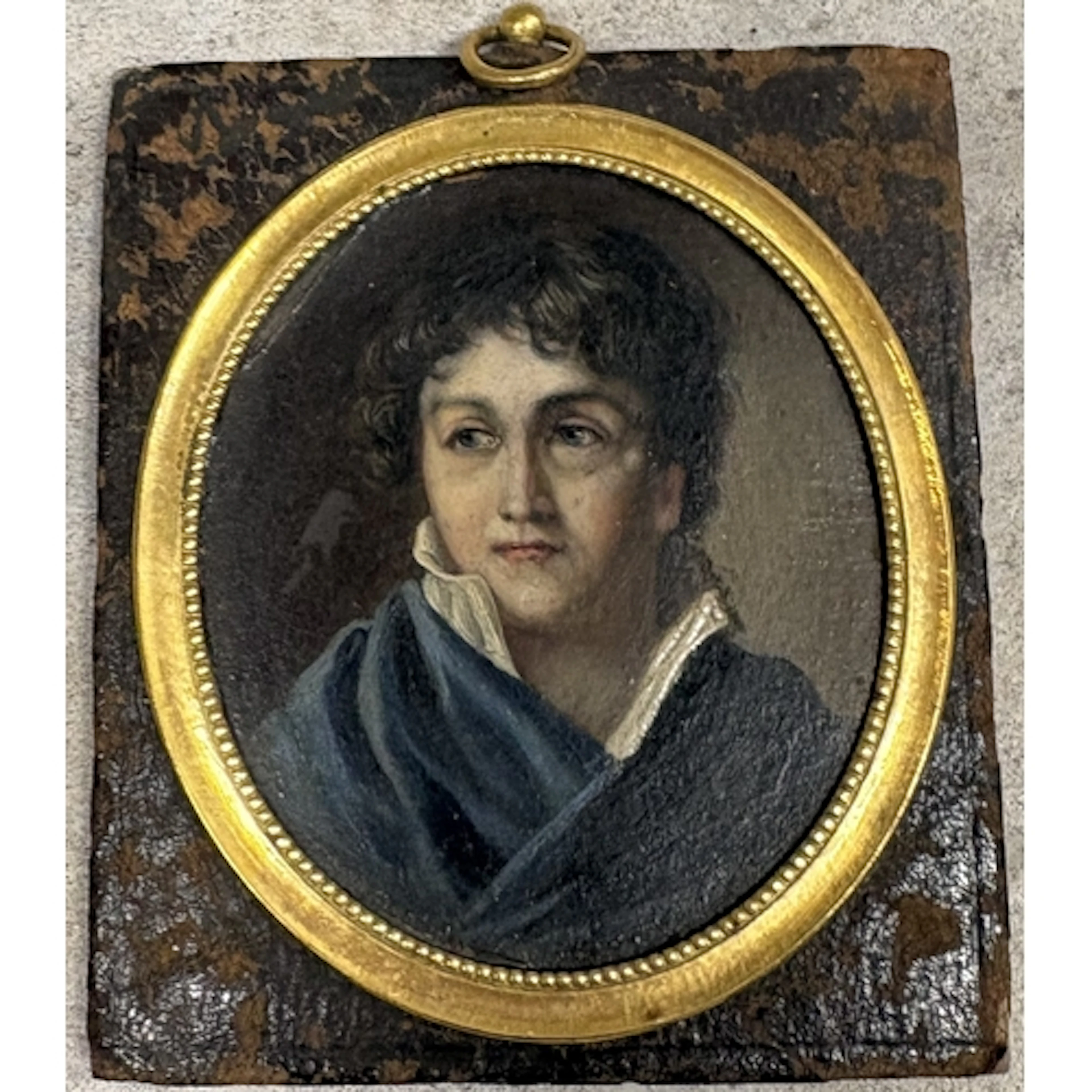 A framed and glazed miniature oil portrait depicting Madame ...