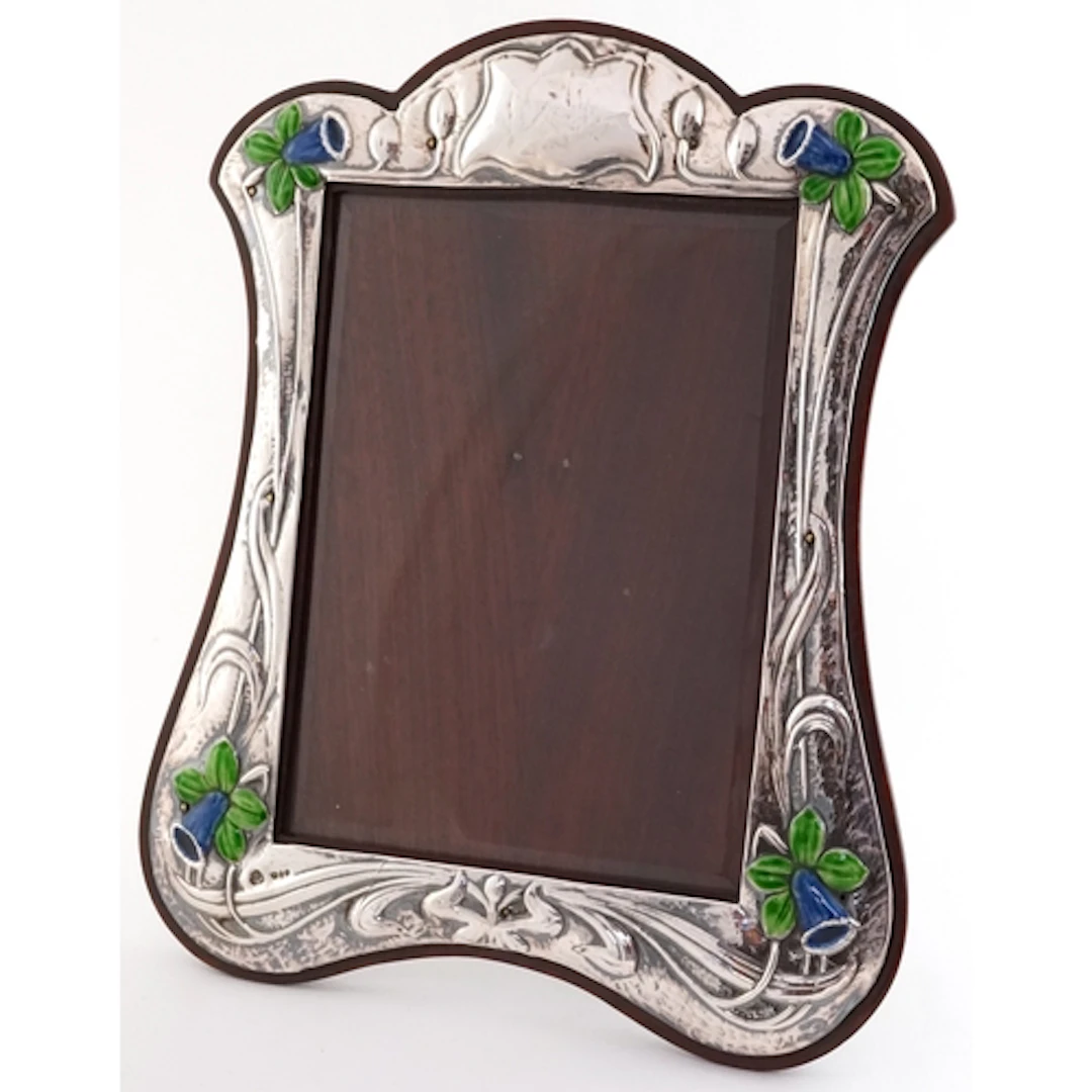 CSR Ltd., large Art Nouveau style silver, enamel and oak eas...