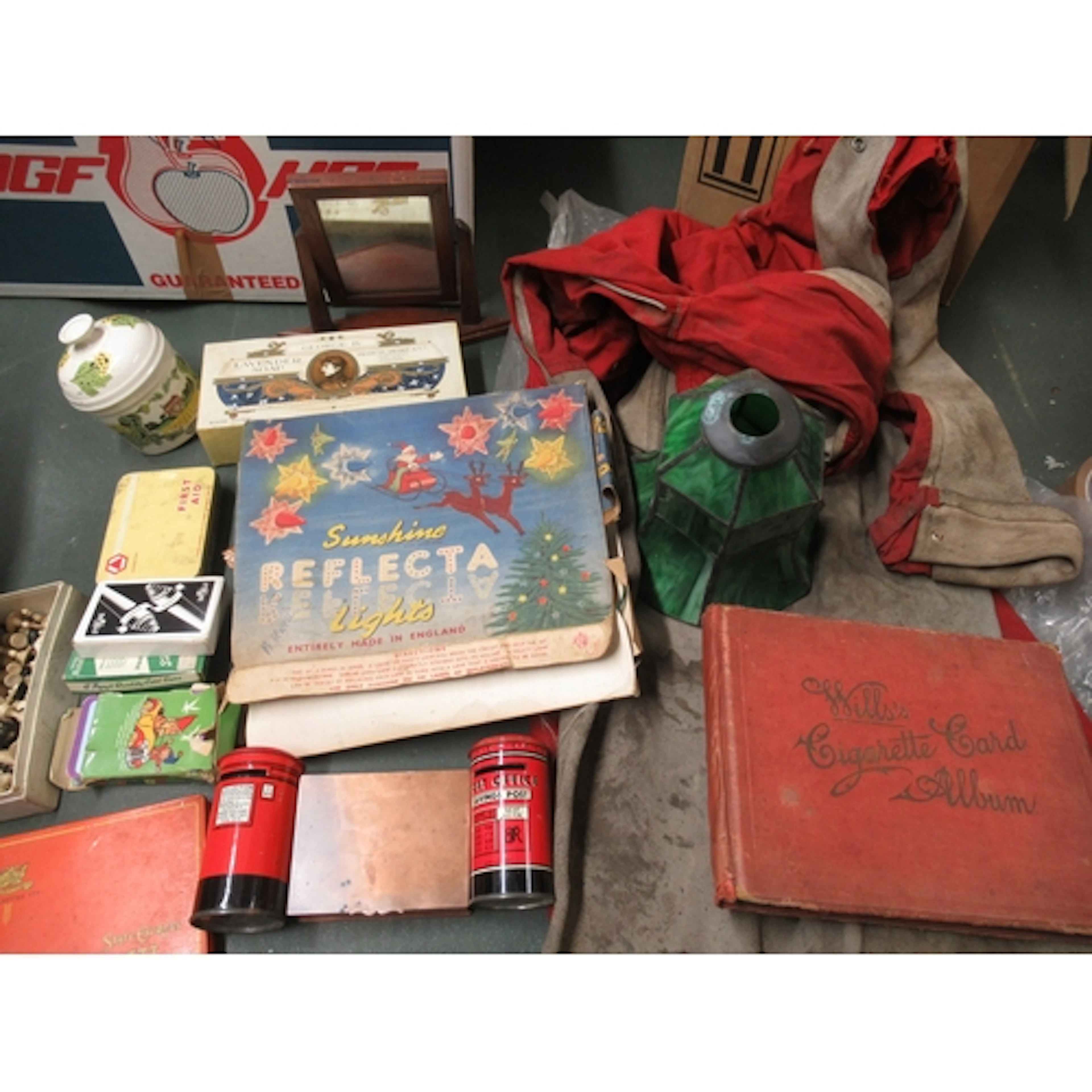 Cigarette card album, quantity of trade tins and boxes and s...